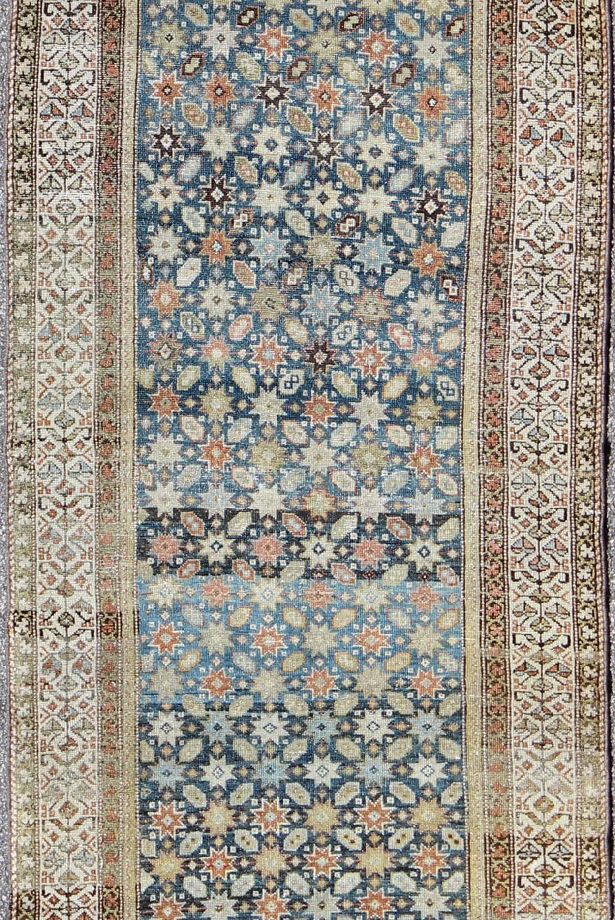 Hand-Knotted Colorful Antique Persian Malayer Runner with Blue Background, Floral Motifs For Sale