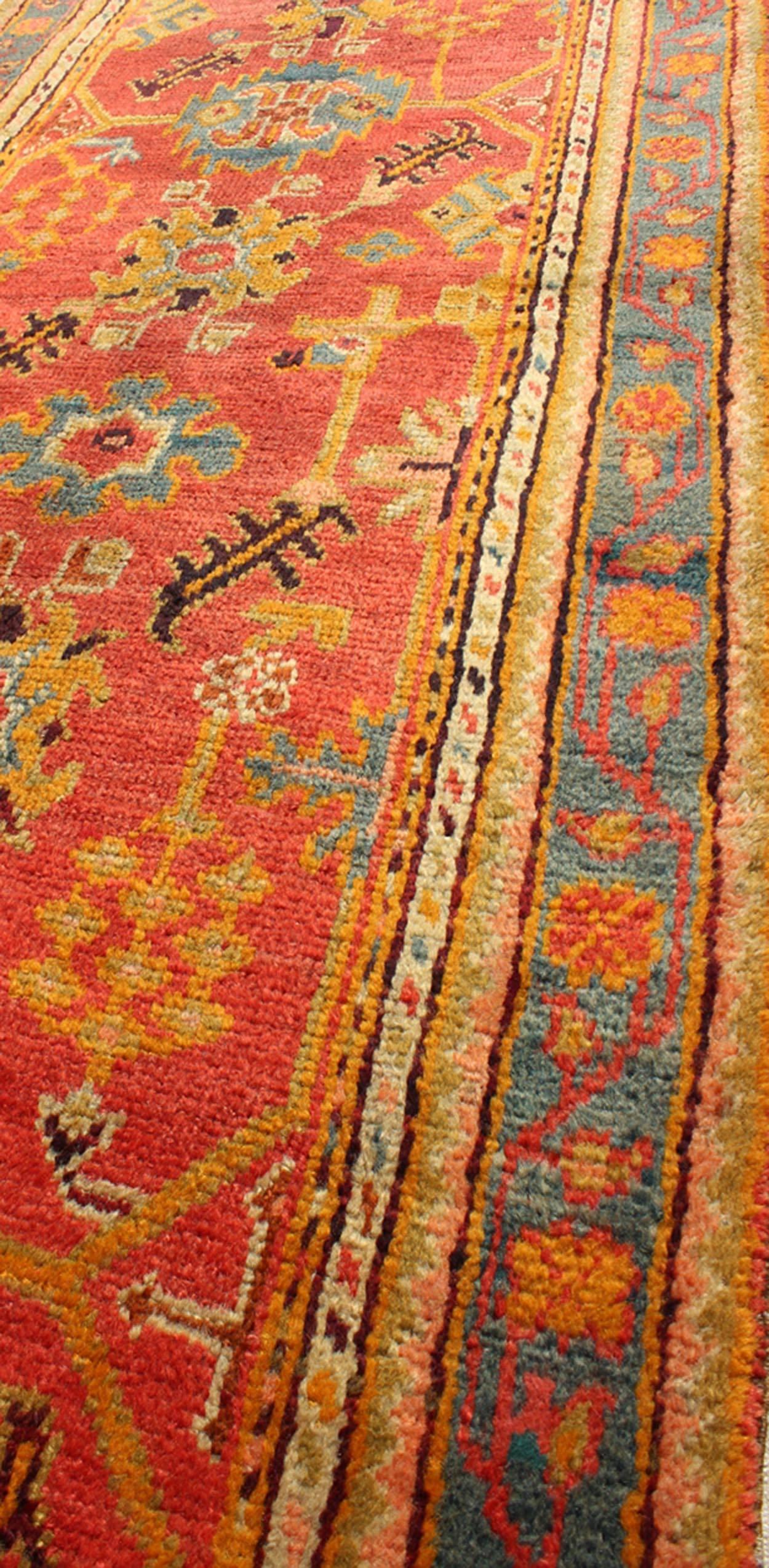 Early 20th Century Colorful Antique Turkish Oushak Wide Runner with Geometric Tribal Motifs For Sale