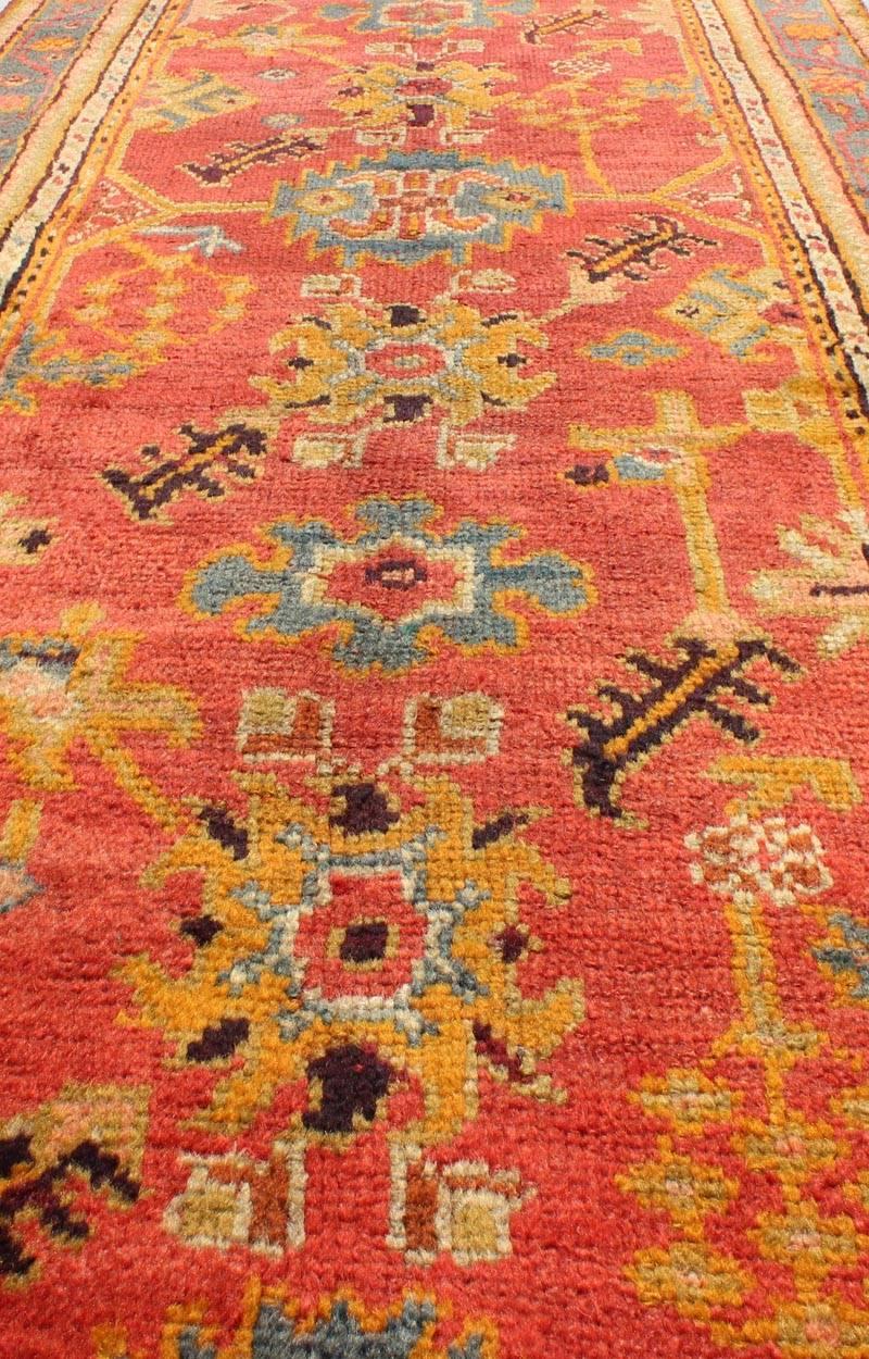 Wool Colorful Antique Turkish Oushak Wide Runner with Geometric Tribal Motifs For Sale