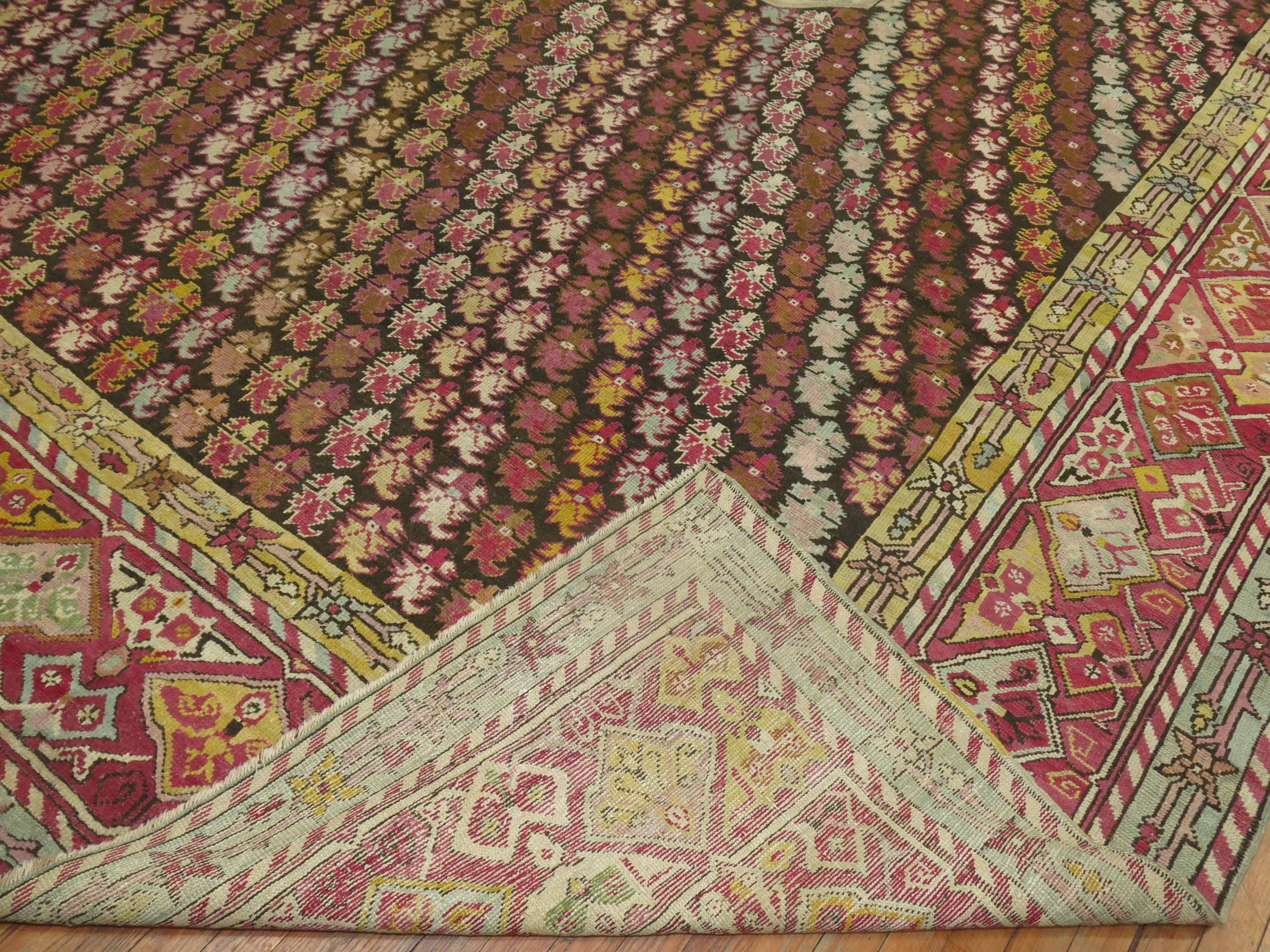 Buntfarbener antiker türkischer Teppich aus Ghiordes Village (Türkisch) im Angebot