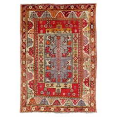 Colorful Antique Turkish Small Oushak Carpet in Multi Layered Design