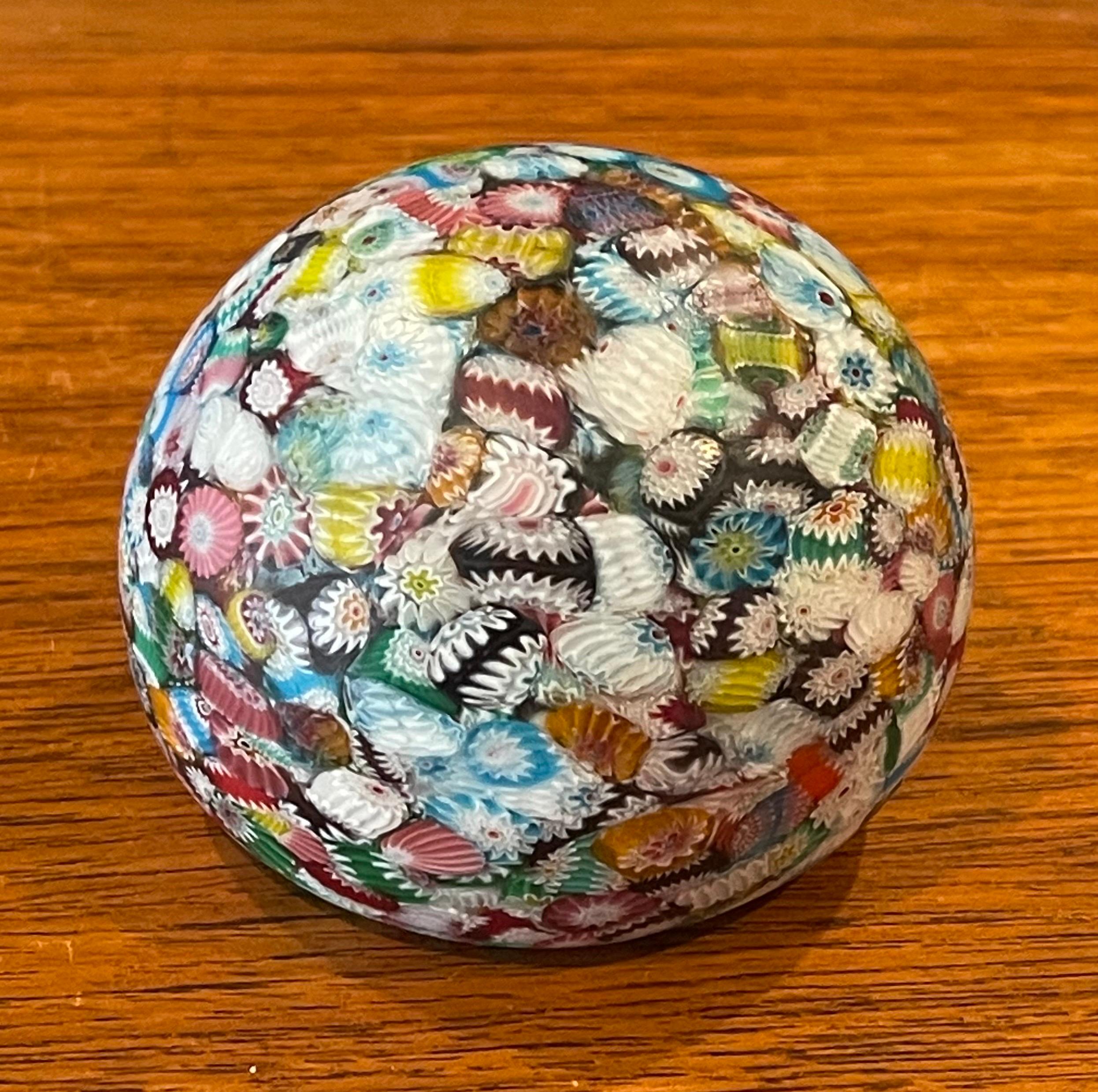 Small colorful art glass paperweight by Millefiori of Italy, circa 1980s. The piece is in very good condition with no chips or scratches and measures 3.25