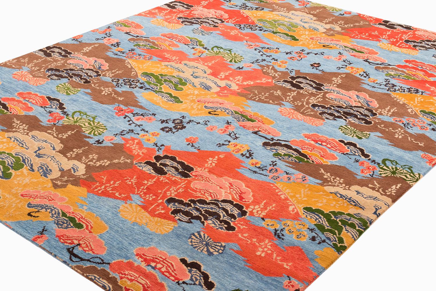 Delicate flowers and Eastern motifs are scattered throughout Mountain Blossom's vibrant composition. This colorful Asian-inspired rug is cheerful and sophisticated for many interior applications. Floral ornamentation, the illusion of mountains or