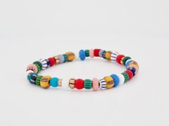 Colorful bracelet with diamond elements, made of african glass beads
