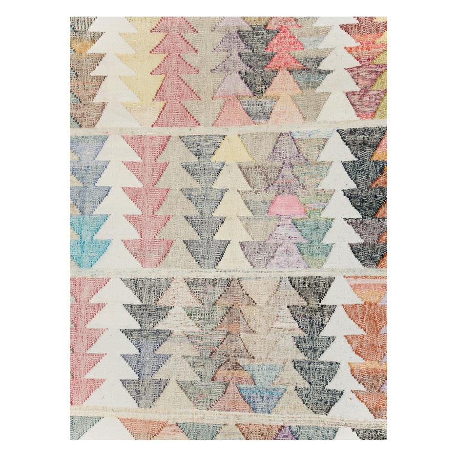 A modern Turkish flat-weave Kilim room size carpet handmade during the 21st century with a contemporary and colorful design.

Measures: 10' 9