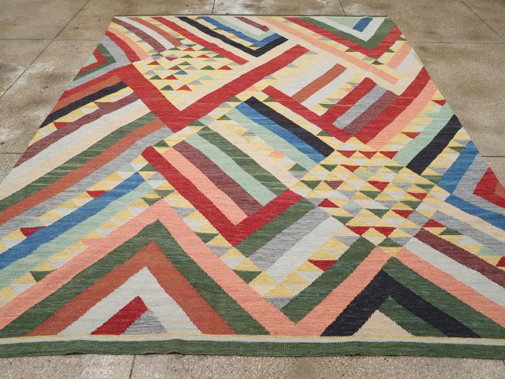 A colorful modern Turkish flatweave Kilim room size carpet handmade during the 21st century.

Measures: 9' 9