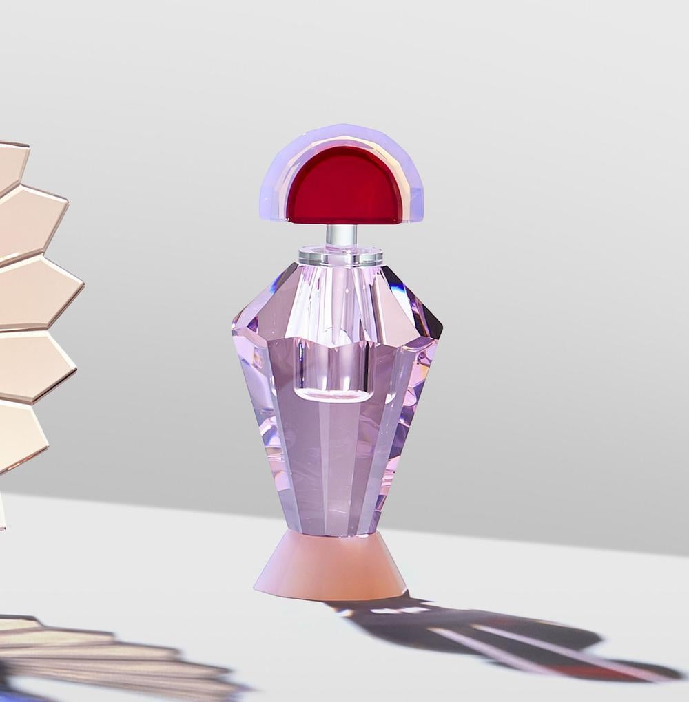 Colorful crystal perfume flacon, hand-sculpted contemporary crystal
Hand-sculpted in crystal
Measures: Small:
Height 16.5 cm
Width 8 cm
Depth 8 cm
Weight 0.8 kg
Material: Fine handcut crystal 

The collection has 4 fine handcut crystal