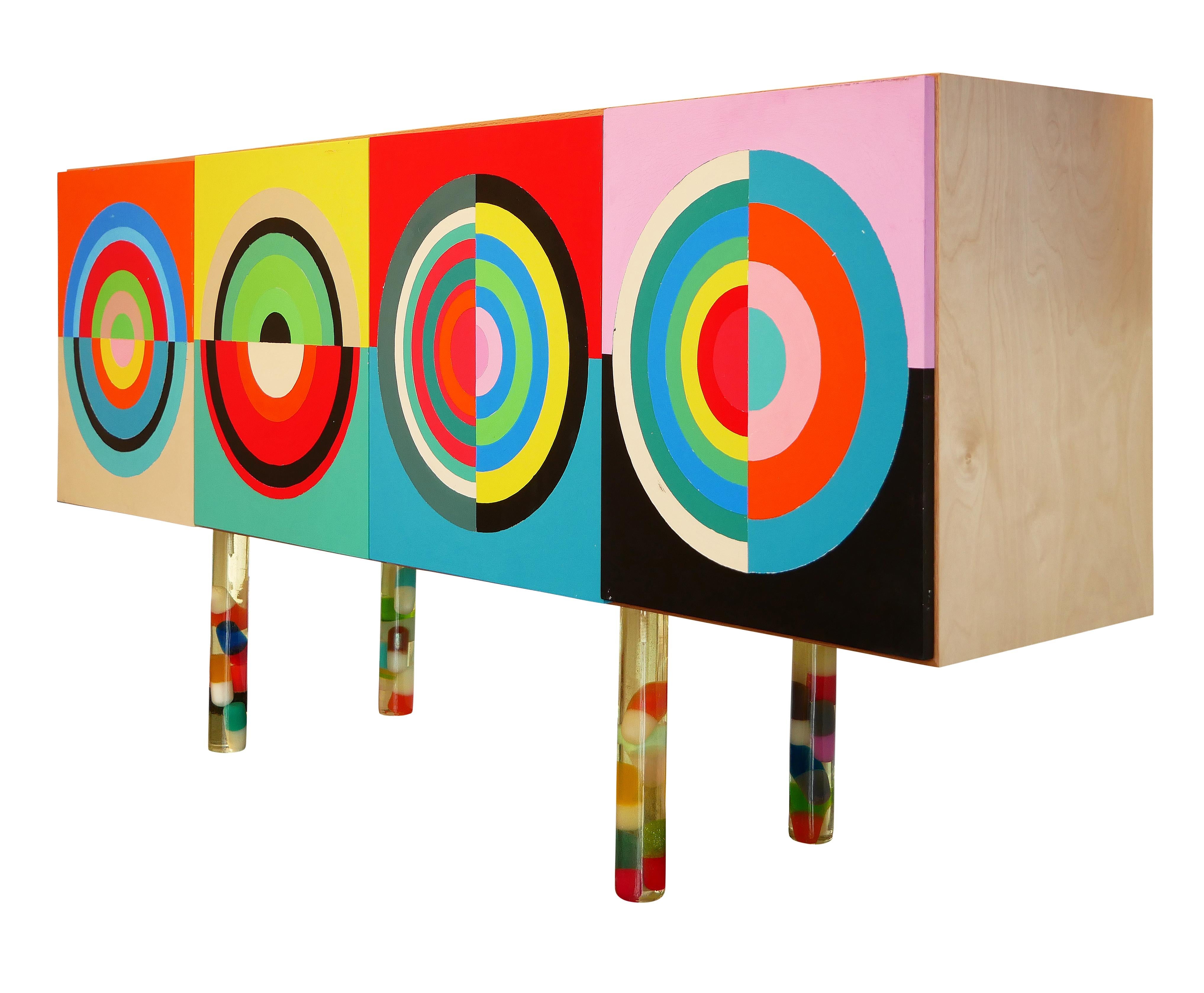 Stunning custom contemporary modern sideboard with colorful abstract paintings by Houston, TX artist Mario Humberto Kazaz. The hand painted door fronts feature four colorful abstract geometric shapes that resemble a target. This sideboard has two