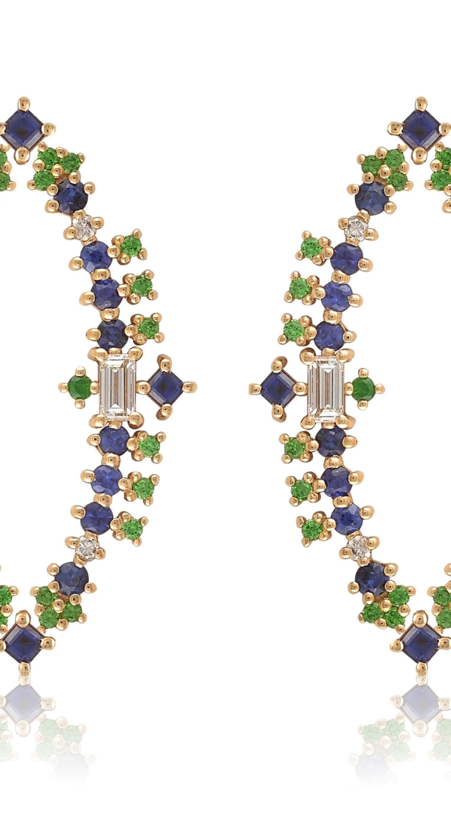 Designer: Alexia Gryllaki
Dimensions: L38x23mm
Weight: approximately 7.4g (pair)
Barcode: OFS055

Multi-stone earrings in 18 karat yellow gold with round faceted sapphires approx. 1.84cts, round faceted tsavorites approx. 0.52cts, round