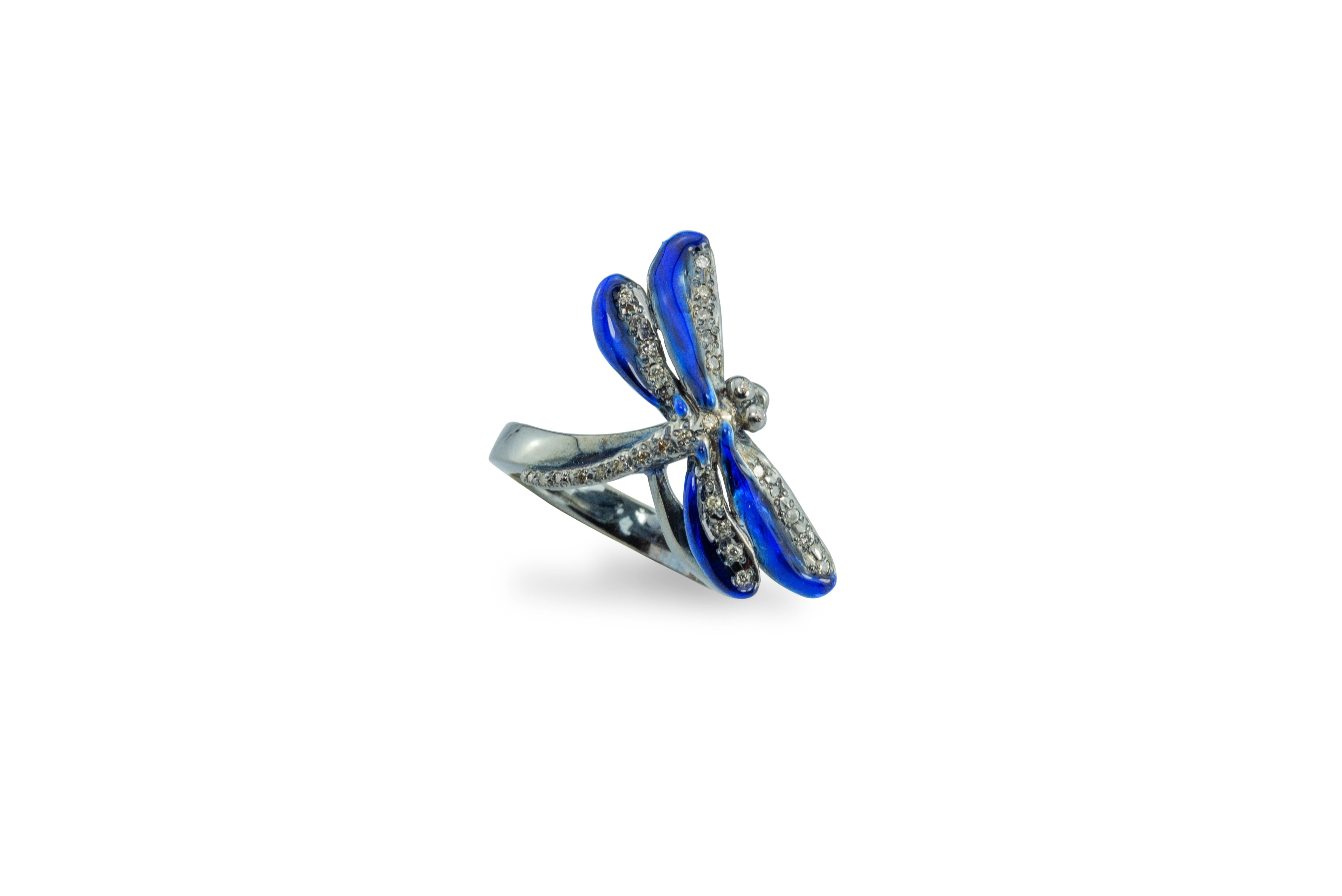 Colorful Enamel Unique Piece Burnished Silver Blue Enameled 0.20 Karat White Diamond Dragonfly Design Ring
Available size: size 14 other sizes available in two weeks
Elegant burnished silver and 0.20 karat white diamonds stones wrapped with enamel,