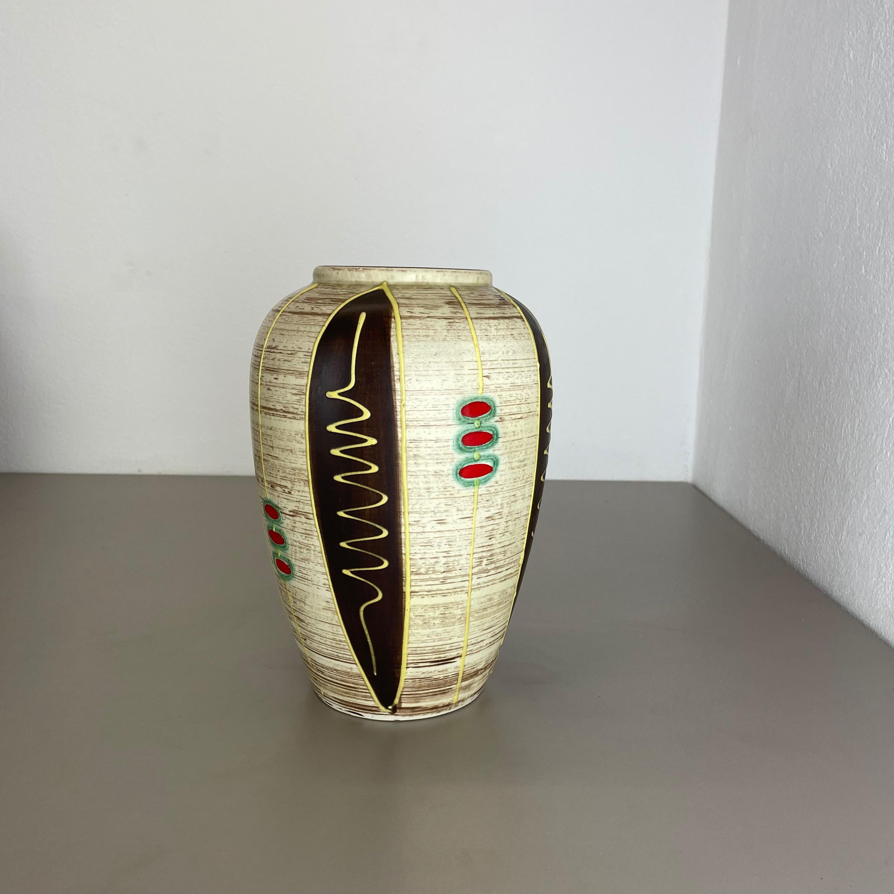 Article:

Pottery ceramic vase


Producer:

JASBA Ceramic, Germany



Decade:

1970s




Original vintage 1950s pottery ceramic vase made in Germany. High quality German production with a nice abstract illustration with stripes and