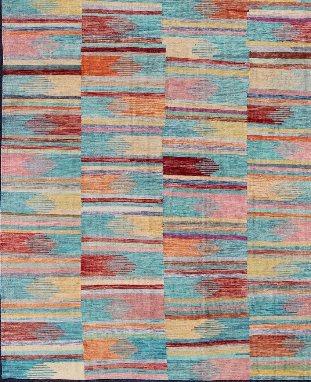 Casual flat-weave modern design Kilim rug with rainbow colors in modern design, Keivan Woven Arts / rug afg-27679, country of origin / type: Afghanistan / Kilim
Colorful flat-weave modern Kilim rug with modern design for modern interiors.
This fun