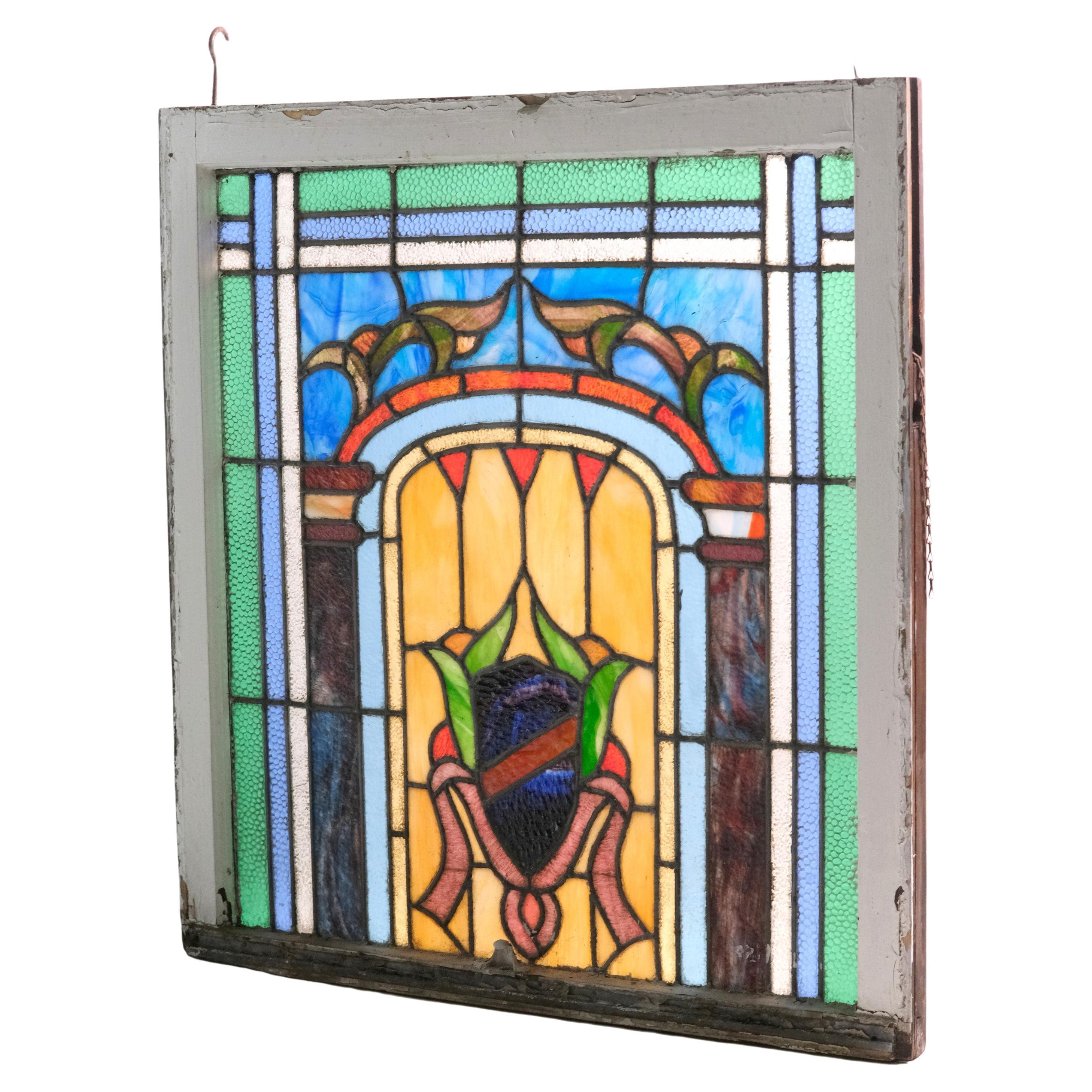 Colorful Framed Stained Glass Window Shield Crest Design