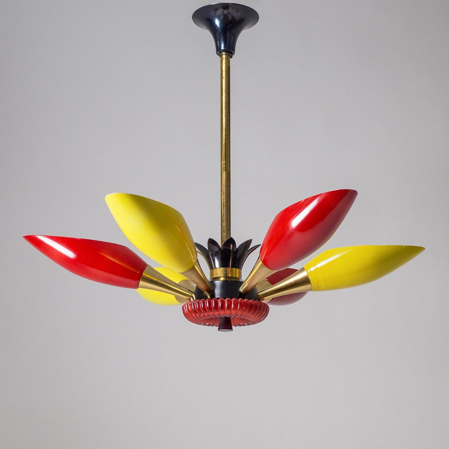 Rare French colorful glass chandelier from the 1960s. Alternating yellow and red enameled glasses are mounted on brass and anodized aluminum hardware with a red glass centerpiece. Very nice original condition with patina on the brass stem and minor