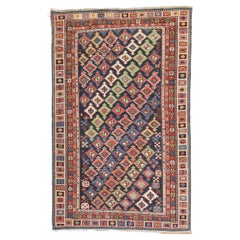 Tapis Shirvan caucasien ancien géométrique et coloré