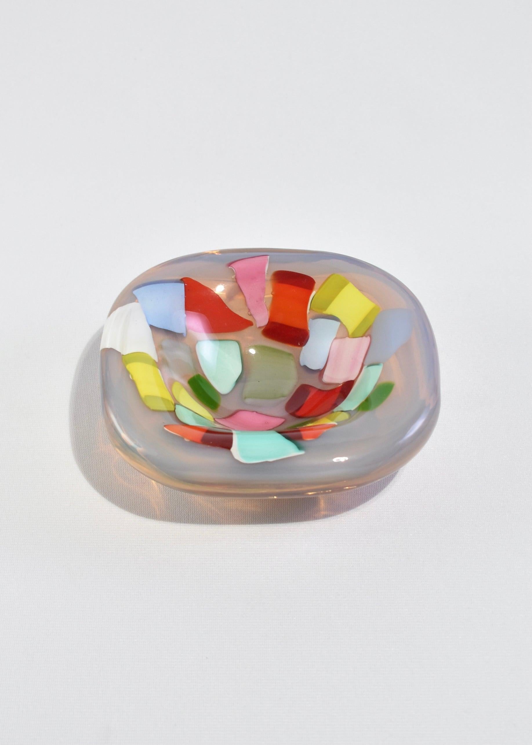 Vintage handblown thick opalescent glass catchall with colorful detail.