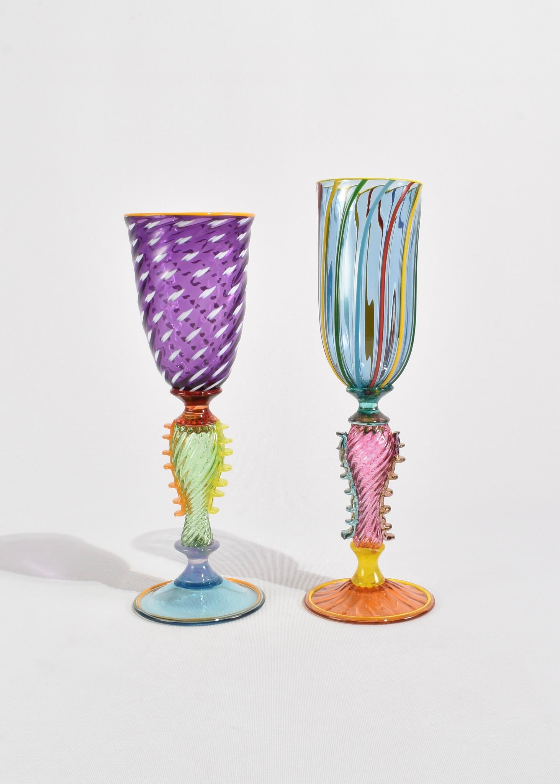 Colorful Venetian inspired glass goblet set by renowned artist, Robert Dane. Etched initials, RD, on the base. Please note the goblets vary slightly in height.

Robert's work is on display in numerous museums worldwide including the Smithsonian