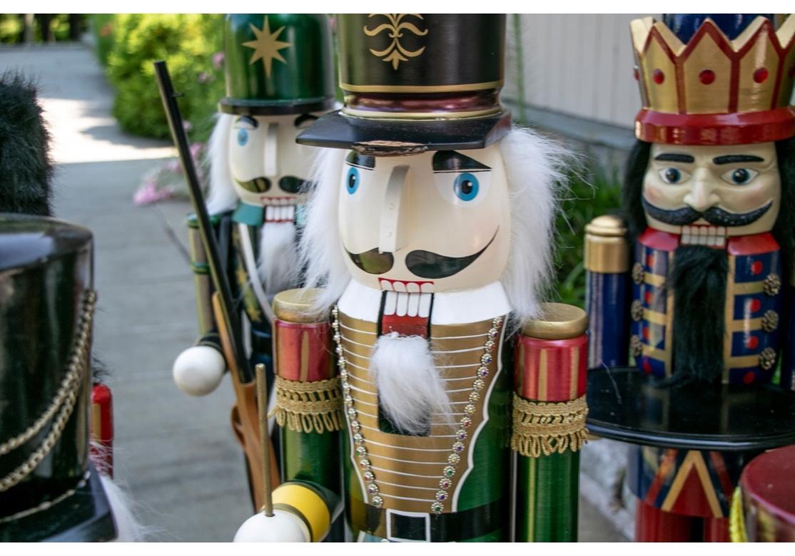 Colorful Group of 8 Large Painted Wooden Nut Cracker Figures In Good Condition In Bridgeport, CT