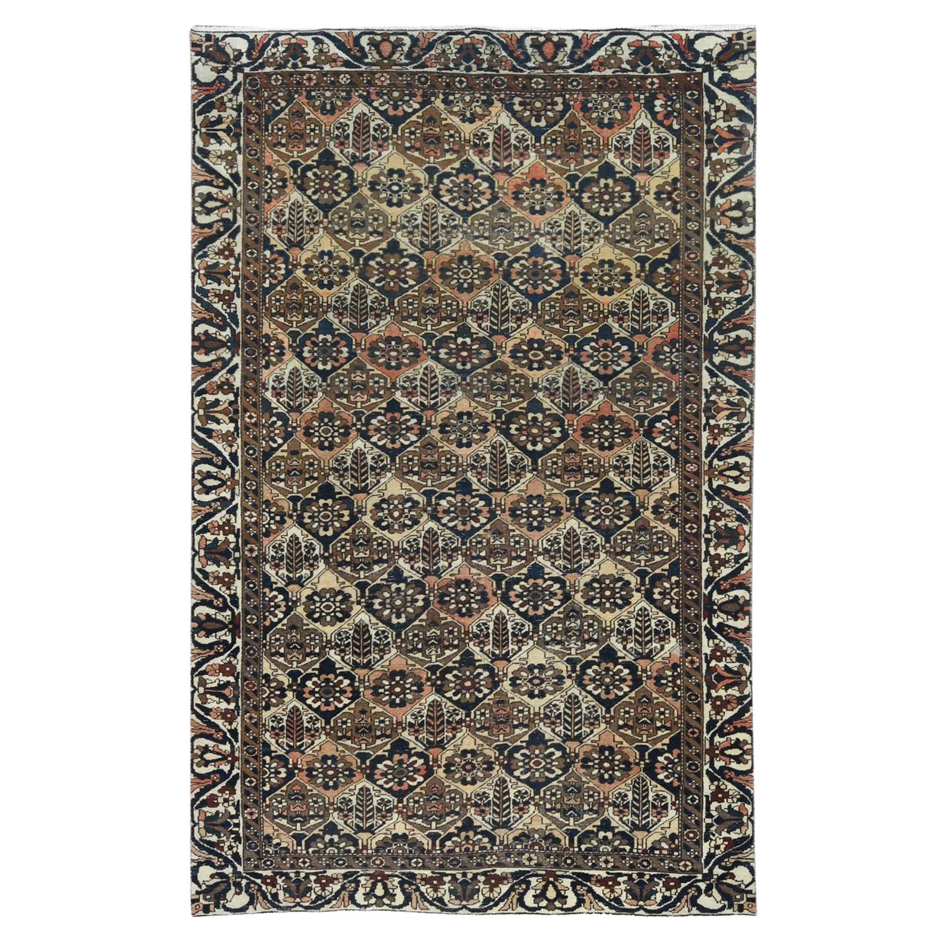 Colorful, Hand Knotted Vintage Persian Bakhtiar, Distressed Look Worn Wool Rug For Sale