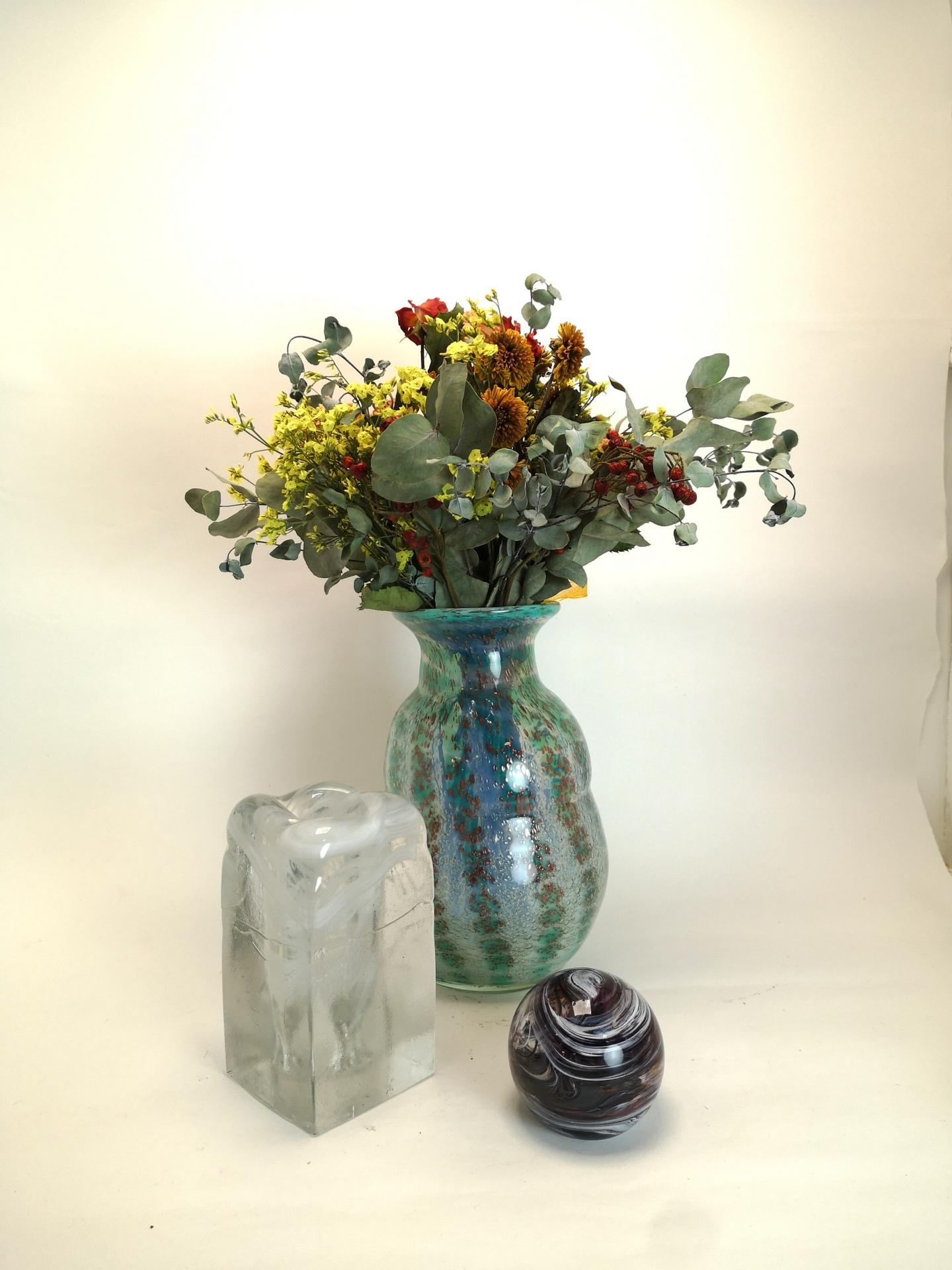 This colorful vase is a unique, hand-made glass piece, with a very extravagant, almost organic design. It has features of italian glass making, most probably from the 1970s Europe. Near perfect condition it's a beautiful addition to any modern or