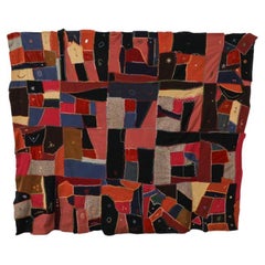 Un colorato quilt vittoriano "pazzo" cucito a mano