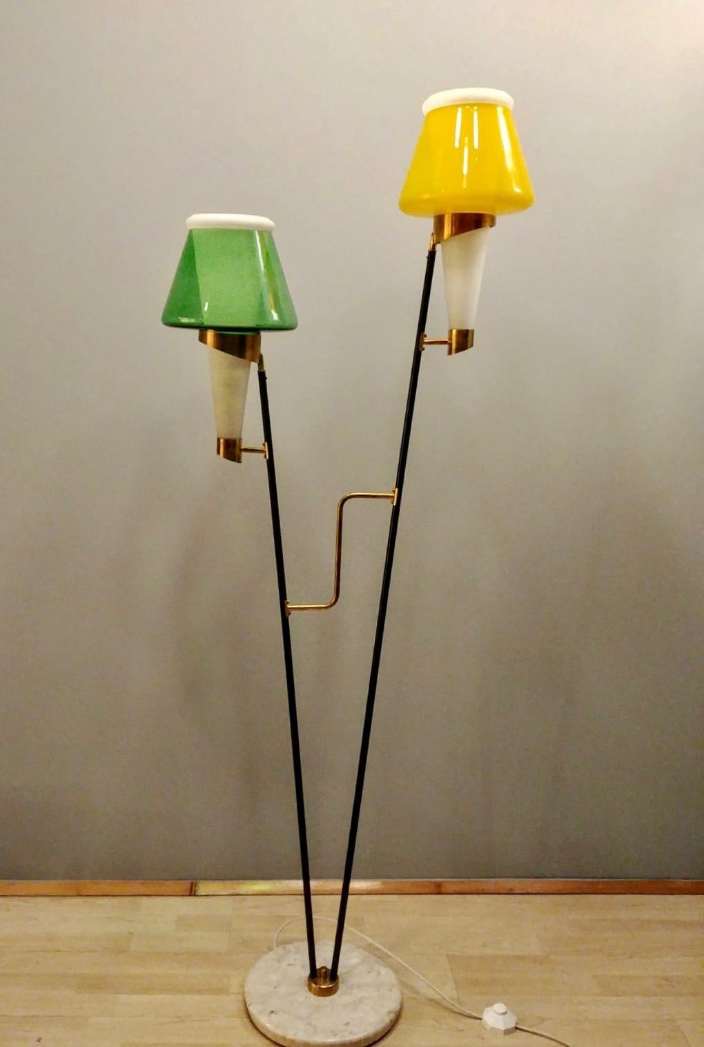 Stylish and striking, 2-light floor lamp with mushroom -shaped frosted glass shades, marble base and brass-plated arms. Italy, 1960s.
