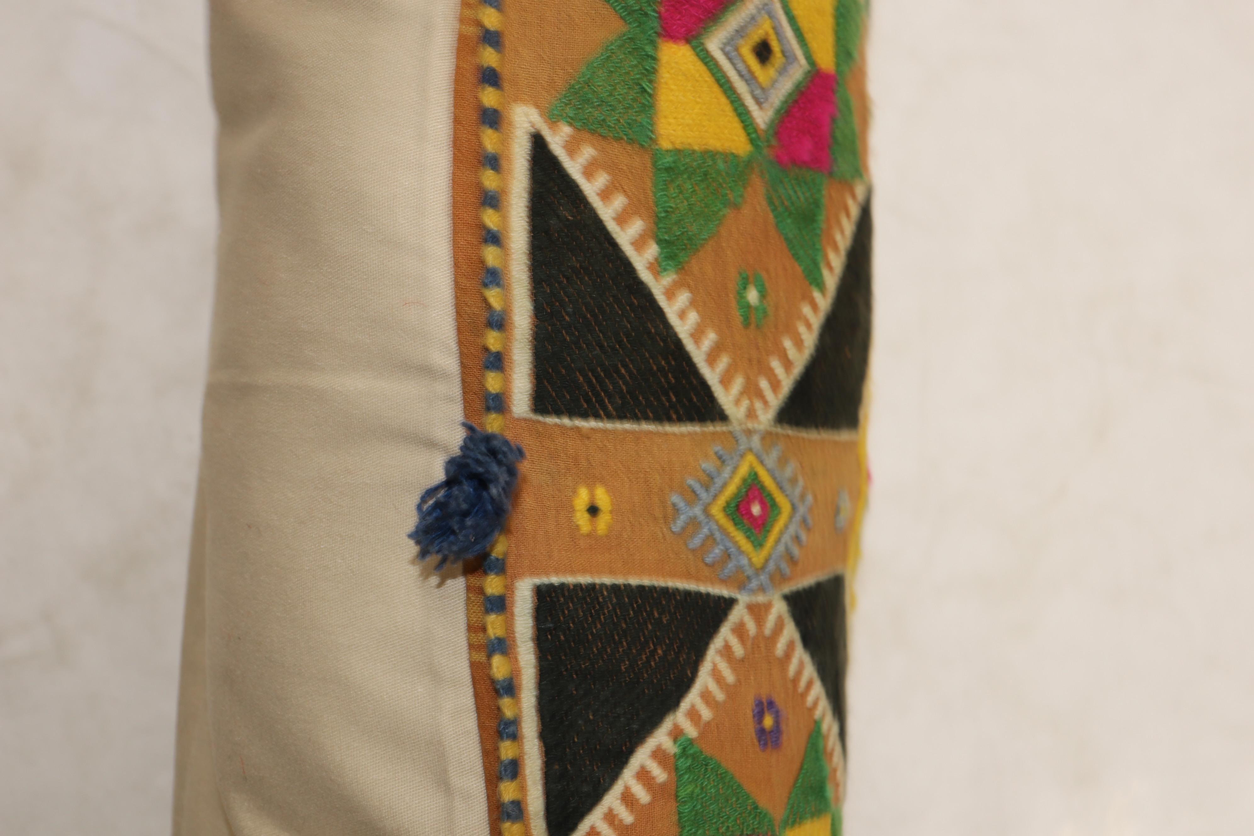 Large pillow made from a colorful Indian textile.

Measures: 15