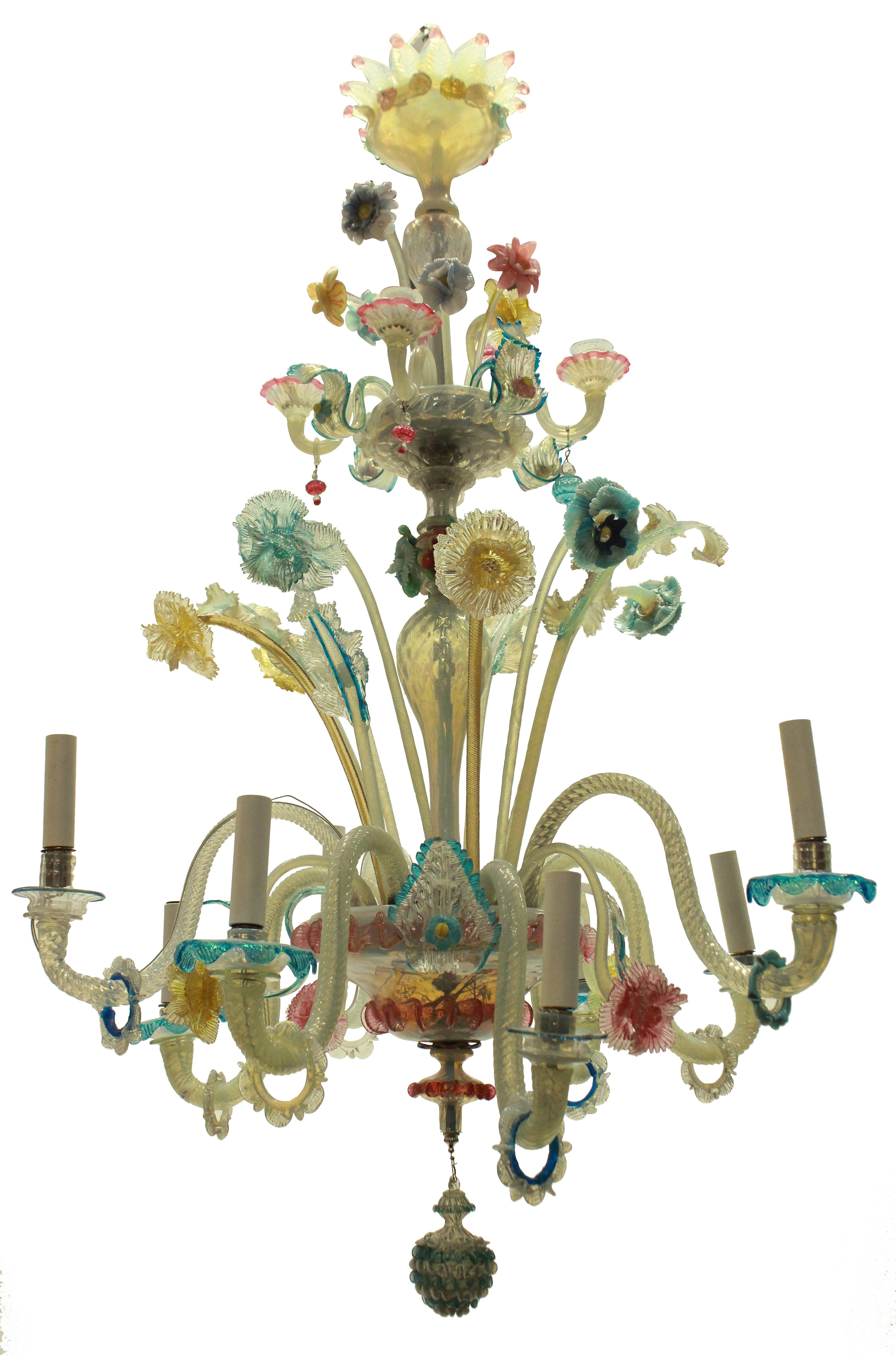 An Italian Murano glass chandelier of many colors, with playful flowers and leaves. Some historic losses to glass.