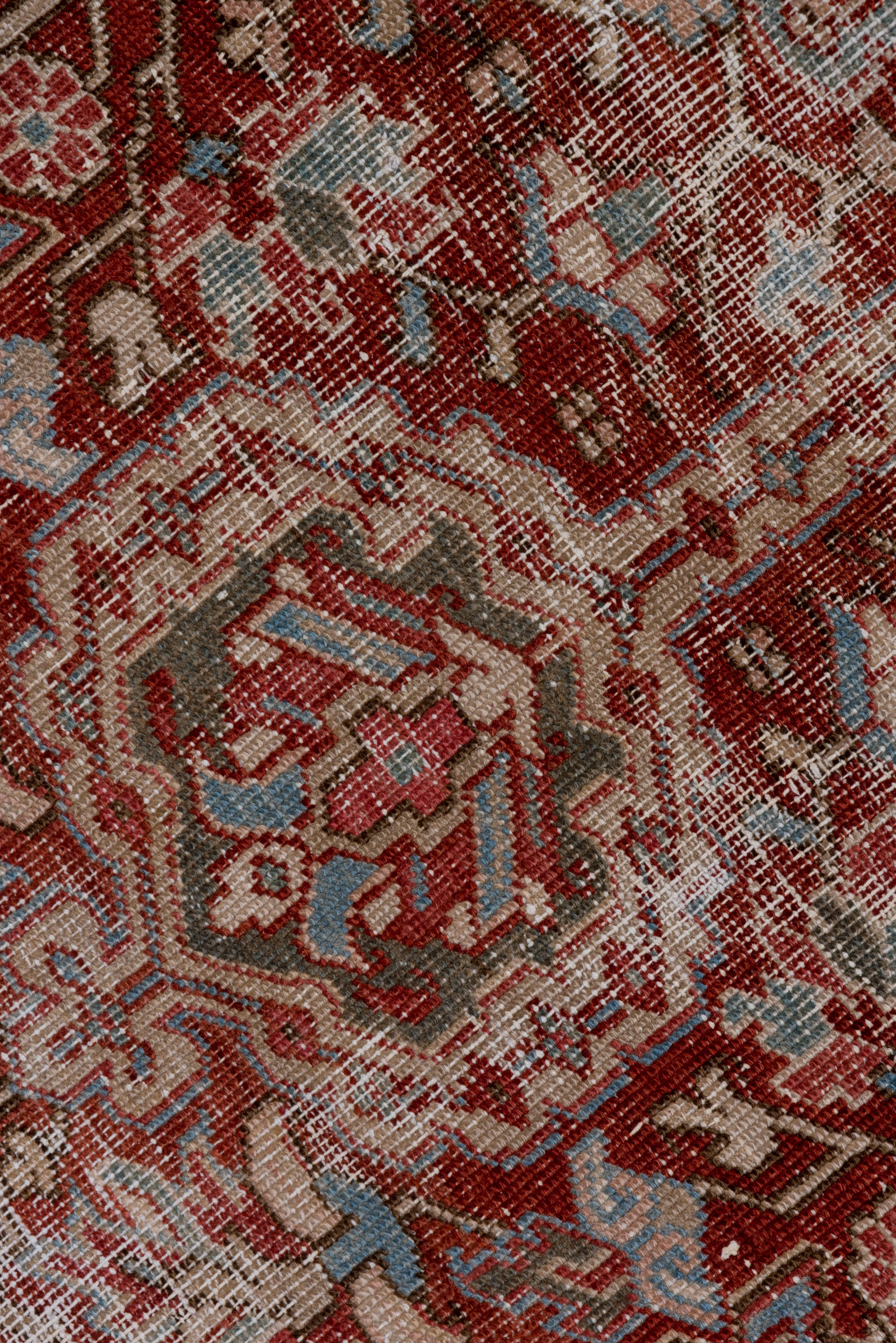 Colorful Lightly Distressed Antique Persian Heriz Rug, Red Field, Green Borders In Good Condition For Sale In New York, NY