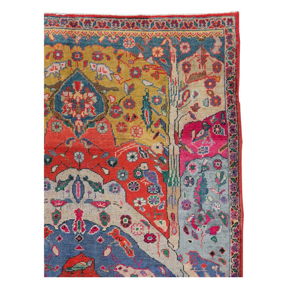 A vintage Persian Tabriz throw rug in square format handmade during the mid-20th century with a colorful pictorial design.

Measures: 3' 1