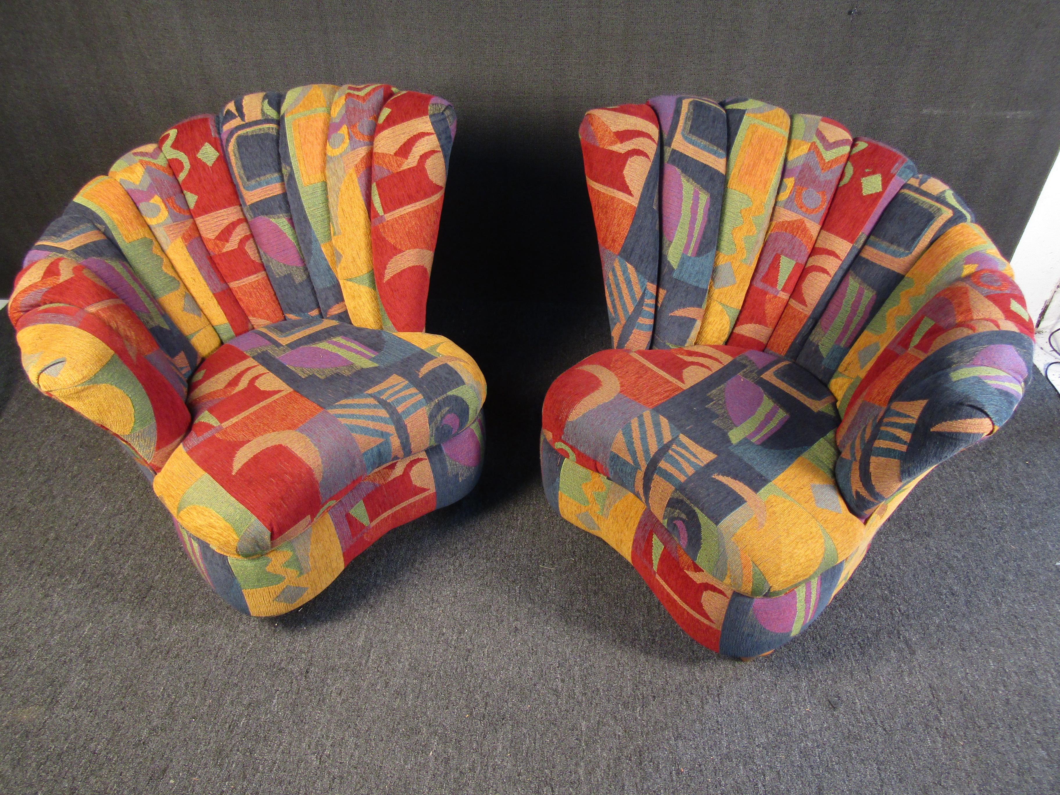 A quirky pair of club chairs that are sure to pop in any space with their playful color and patterning. An interesting Mid-Century Modern design offers comfortable seating while brightening up any space. Please confirm item location with seller