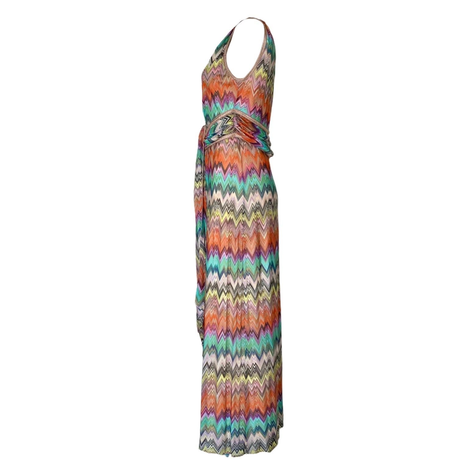 Stunning MISSONI sigature chevron zigzag crochet knit maxi dress
Wonderful rainbow colors
Belt style detail
Buttons in front
Fully lined
Contrast trim
Dry Clean only
Made in Italy
So versatile, can be worn with deep cleavage (buttons open) semi-deep