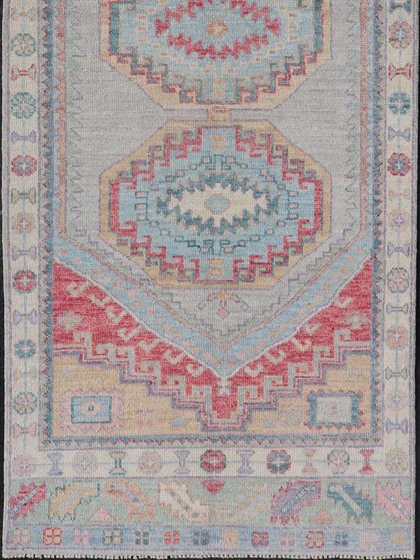 Colorful Modern Oushak Runner with Diamond Medallions and Floral Border. Keivan Woven Arts; rug AWR-4802 Country of Origin: Afghanistan Type: Oushak Design: Medallion, Tribal, All-Over 

This runner features medallions and border, and multi tier