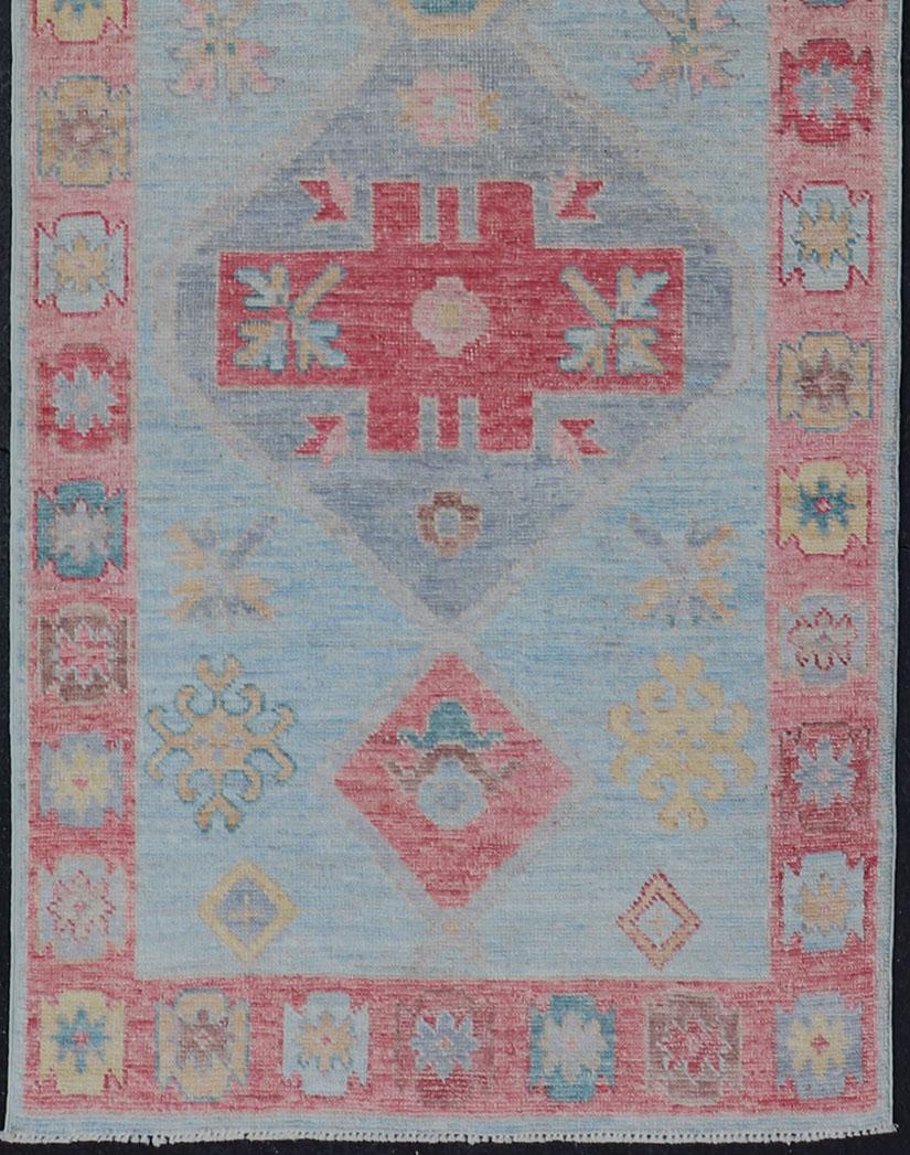 Colorful Modern oushak runner with diamond medallions and tribal border. Keivan Woven Arts; rug AWR-4893 Country of Origin: Afghanistan Type: Oushak Design: Medallion, Tribal. 
Measures: 2'11 x 10'1
This charismatic runner features tribal motifs