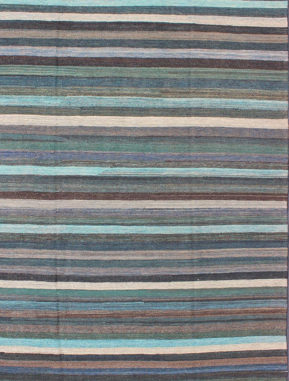 Versatile and unique color-tone flat-weave Kilim for a Modern or Classic design
Flat-weave Kilim rug with vivid tones, rug AFG-6296, country of origin / type: Afghanistan / Kilim

This unique colored piece features a design that evokes an easy