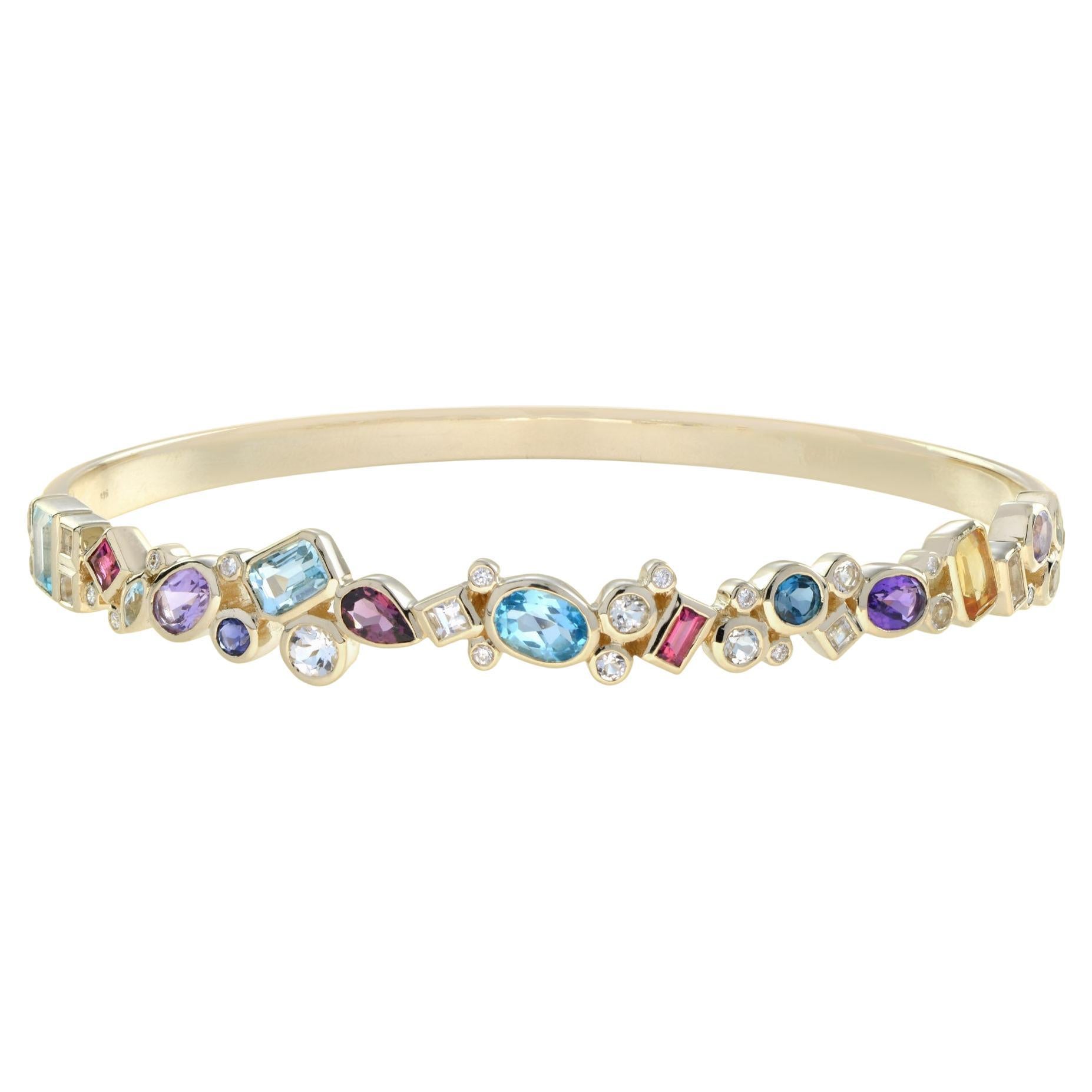 Bracelet manchette en or jaune 14 carats avec plusieurs pierres colorées en vente
