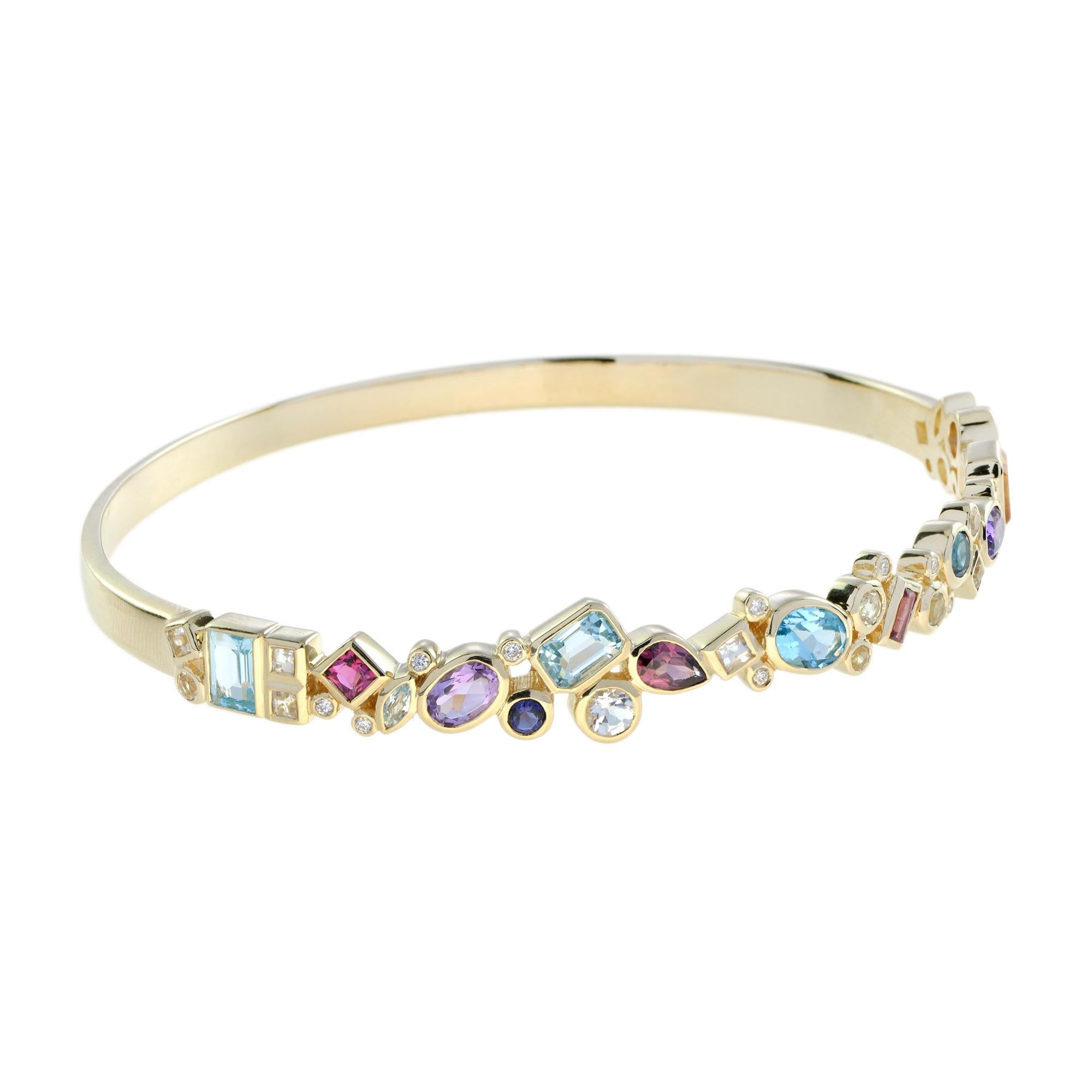 Celebrate color every day with this cheerful multi-gemstone cuff bracelet. Its irresistible design features various-shaped stones of various sizes, including pink and white topaz, London, Swiss, sky blue topaz, amethyst, citrine, iolite, and