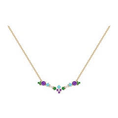 Colorful Necklace in 18kt Gold with Amethysts, Emeralds, Turquoise and Diamonds