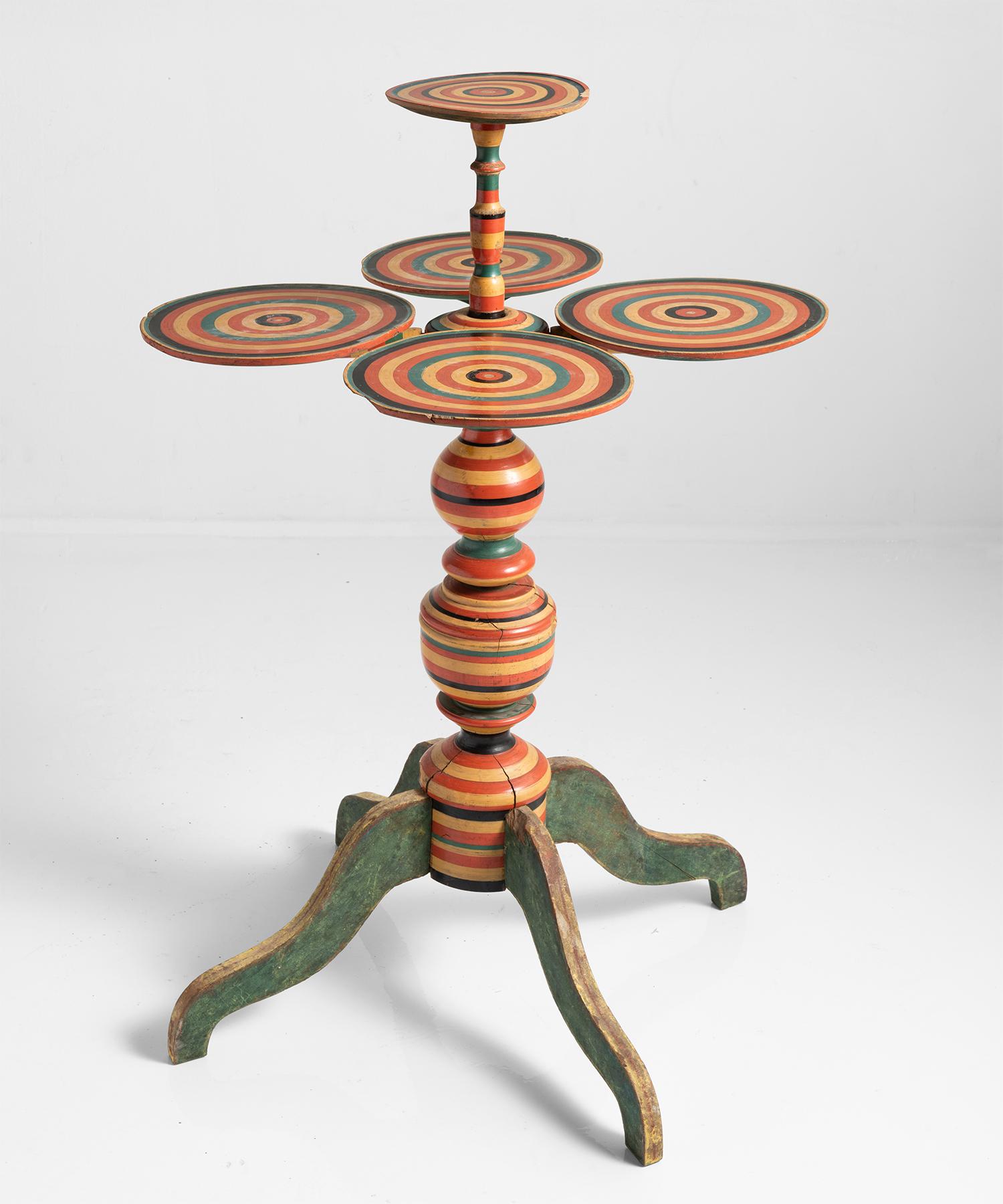 Colorful occasional table, Sweden, circa 1900.

Unique side table with five individual circular trays.

 