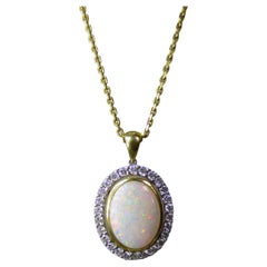 Colorful Opal and Diamond Oval Pendant in 18K Yellow Gold by Lapis Jewelers