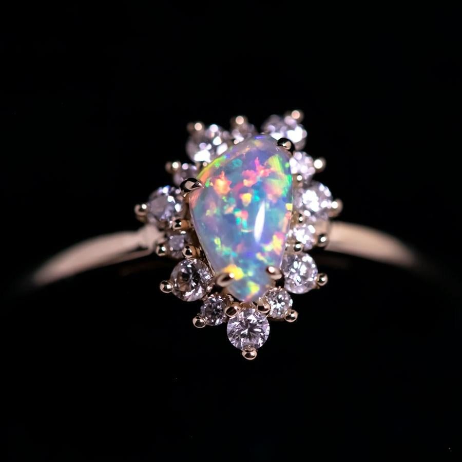 Opale australiano colorato Anello di fidanzamento con diamante a forma di conchiglia fossile in oro giallo 18 carati.


Spedizione nazionale gratuita USPS di prima classe! Borsa o scatola regalo in omaggio con ogni ordine!

L'opale, la regina delle
