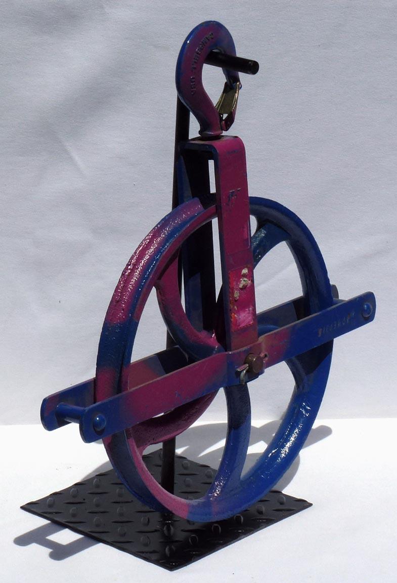 American Colorful Painted Bright Blue Large Industrial Cast Iron Pulley on a Metal Base For Sale