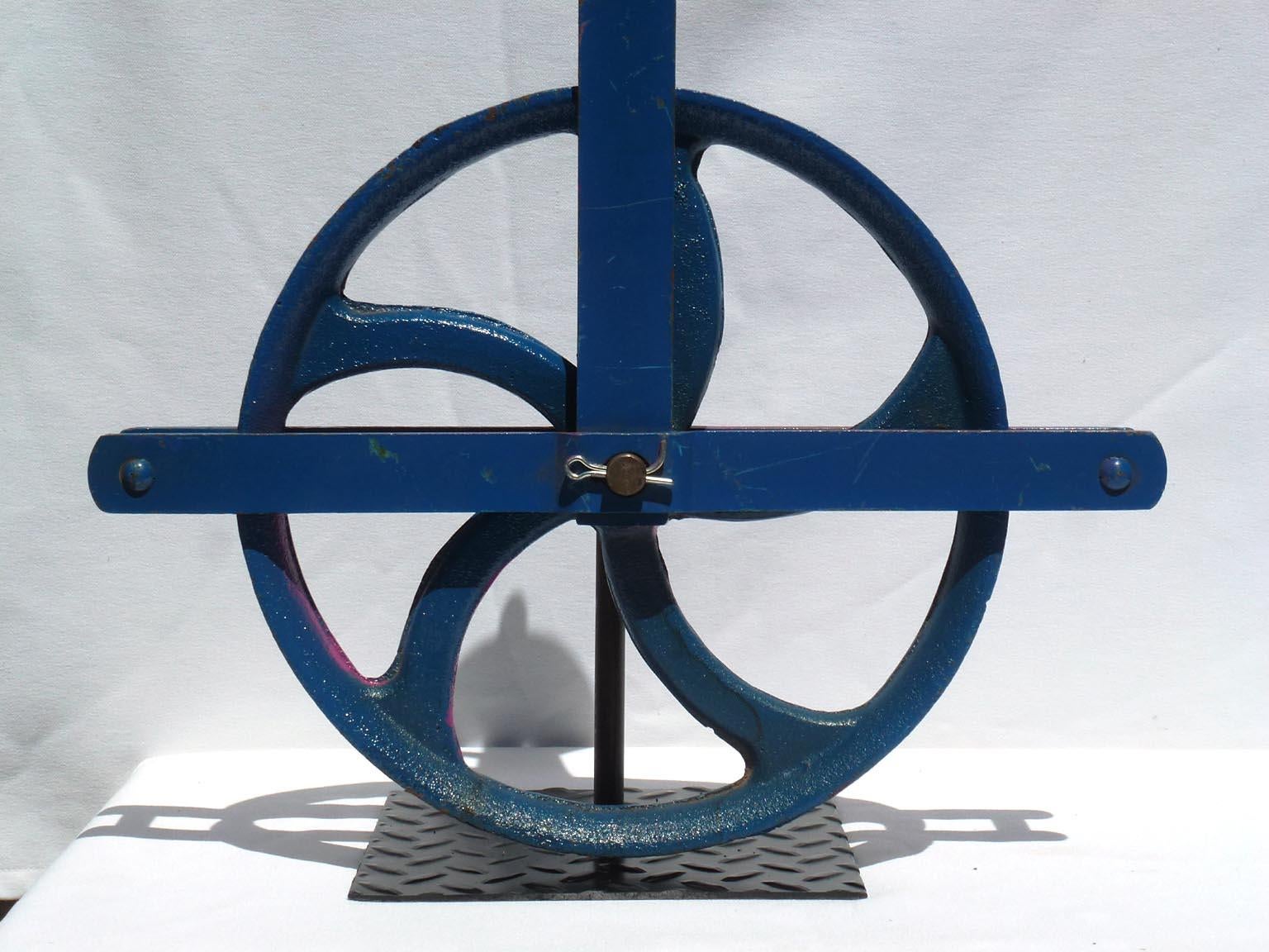 Colorful Painted Bright Blue Large Industrial Cast Iron Pulley on a Metal Base In Good Condition For Sale In Fort Payne, AL