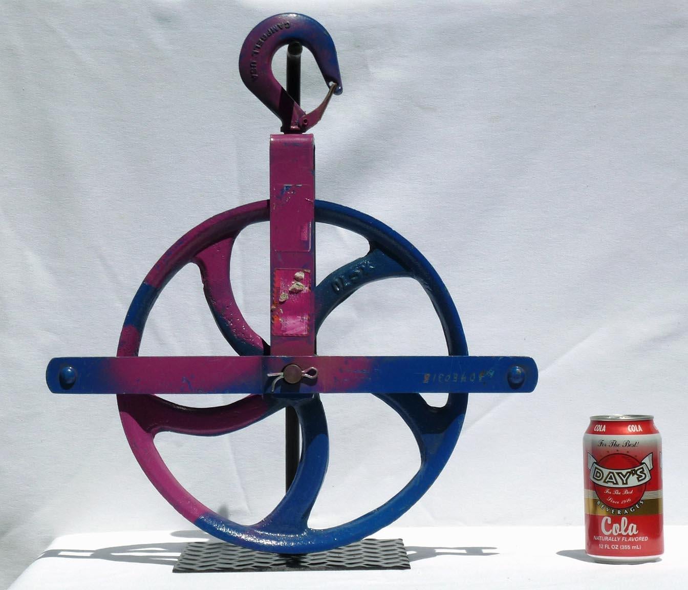 Colorful Painted Bright Blue Large Industrial Cast Iron Pulley on a Metal Base For Sale 2