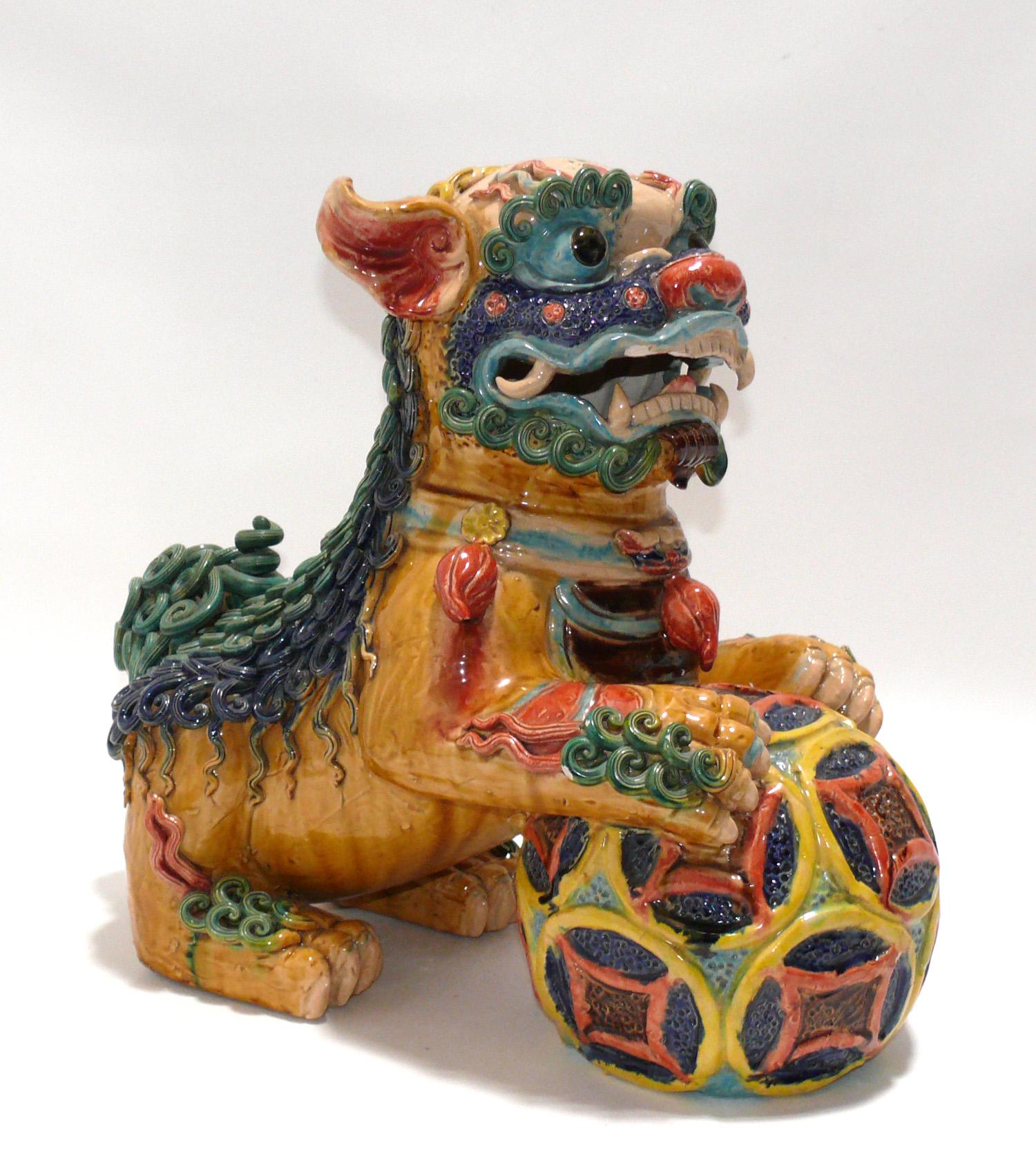 Colorful Pair of Asian Foo Dogs, believed to be Chinese, circa 1960s or earlier. 