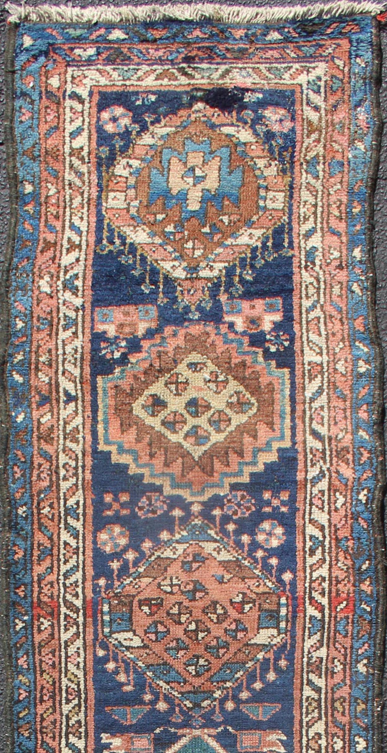 Karadjeh runner with Multi-Medallion design from Persia, rug PR-1094, country of origin / type: Iran / Karadjeh, circa 1910

This magnificent Persian Karajeh from the 1910s bears an exquisite design rendered in jewel tones. Highly stylized