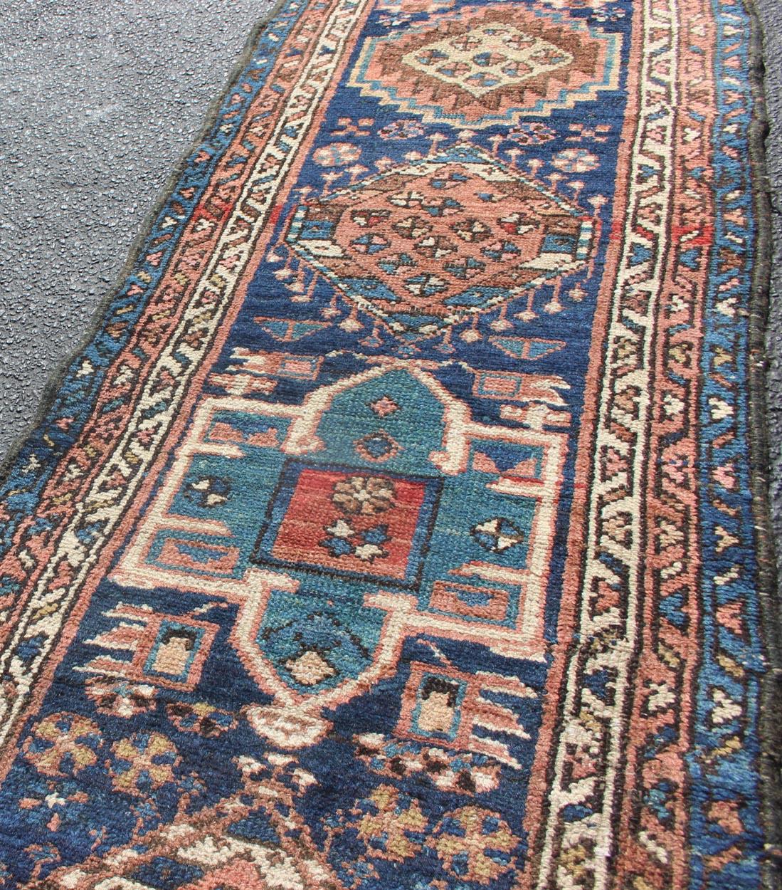 Early 20th Century Colorful Persian Antique Karajeh Runner in Blue and Brown For Sale