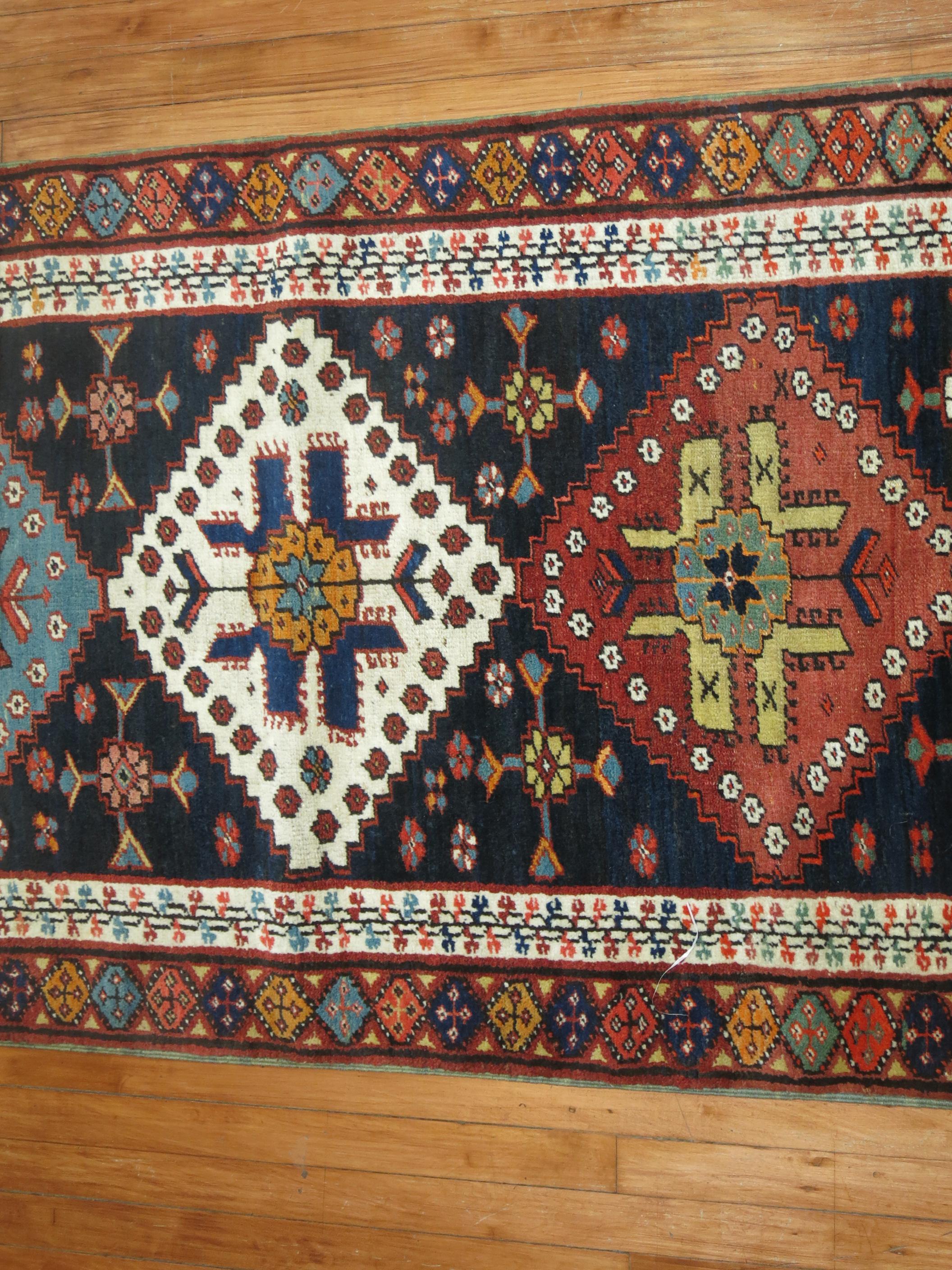 Early 20th Century Colorful Persian Kurd Tribal Geometric Runner For Sale