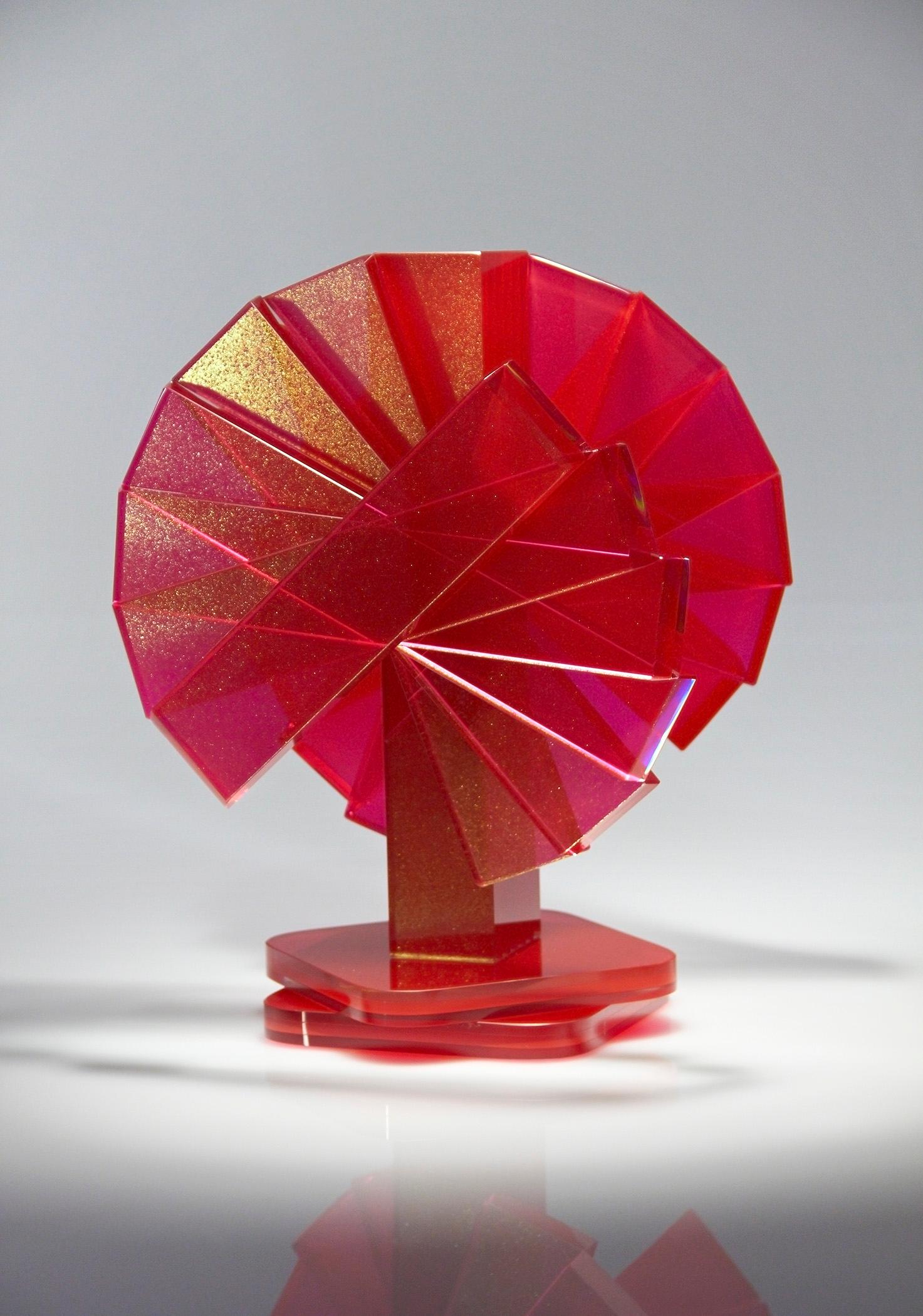 With 40 years in the contemporary glass art field, Sidney Hutter created the Shifting Transmission series to play with emerging special effect pigments from the coatings industry that he mixes with the pigmented adhesive in his traditional