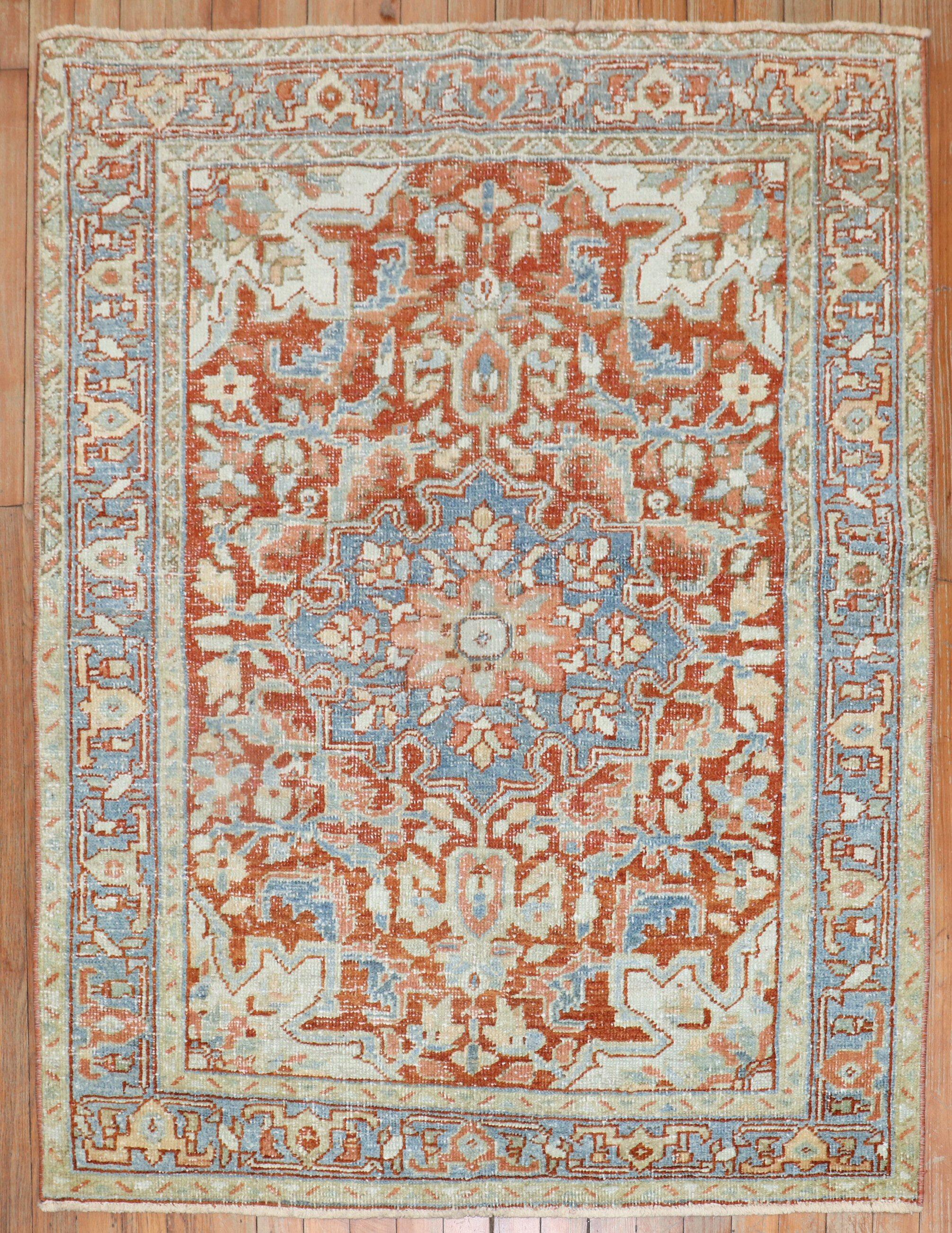 An early 20th-century Persian Heriz small rug.

Measures: 3'7'' x 4'5''.